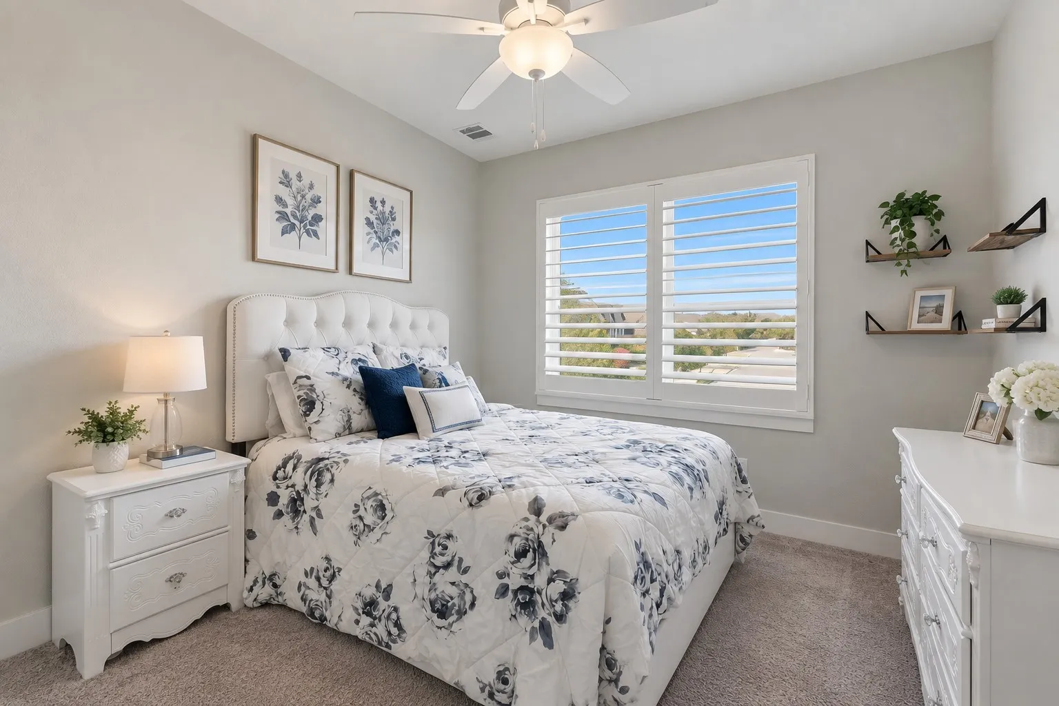 Recessed lighting, ceiling fan, carpet flooring, window with plantation shutters, and built-in wall shelving