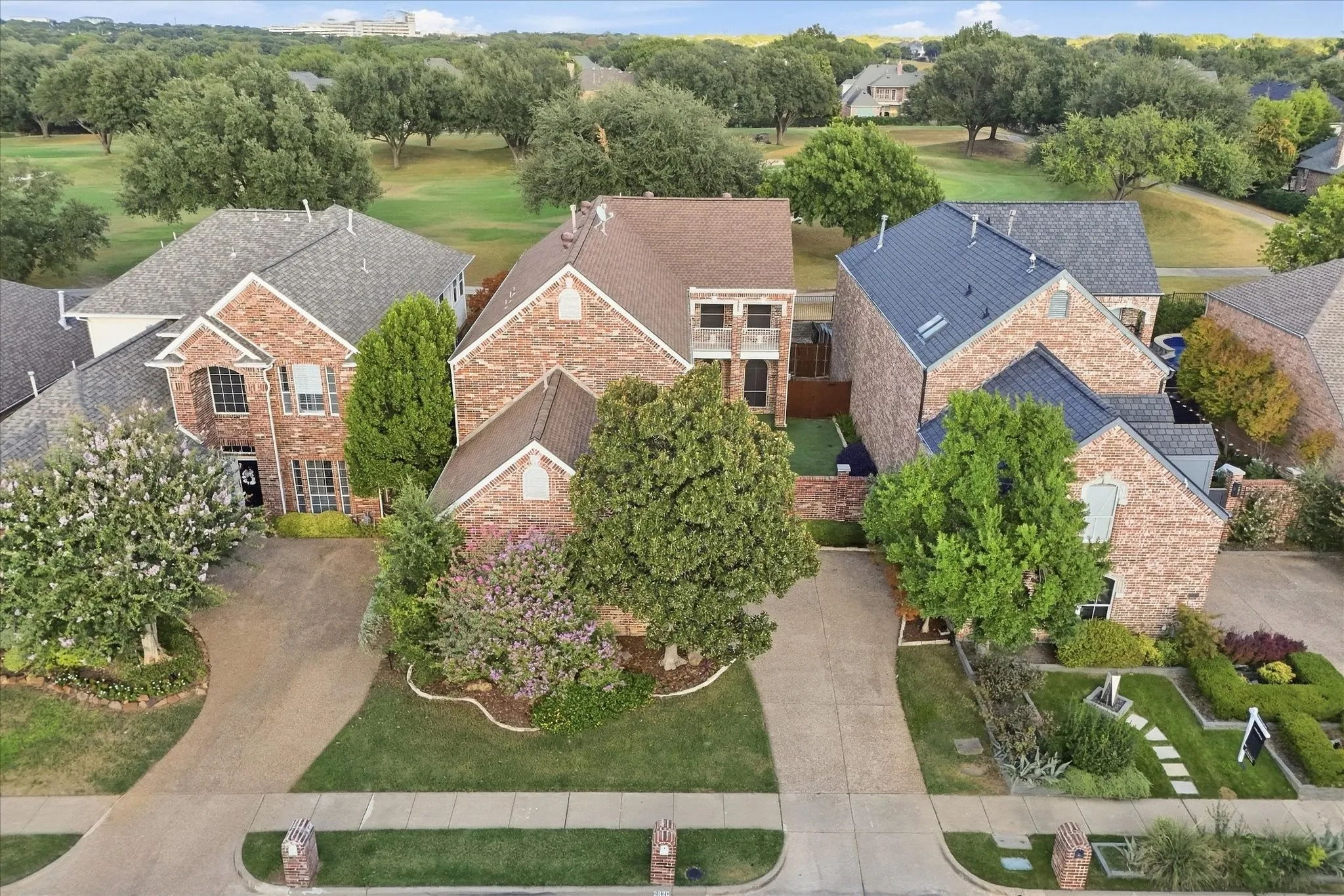 Aerial view of the home backing to the golf course.