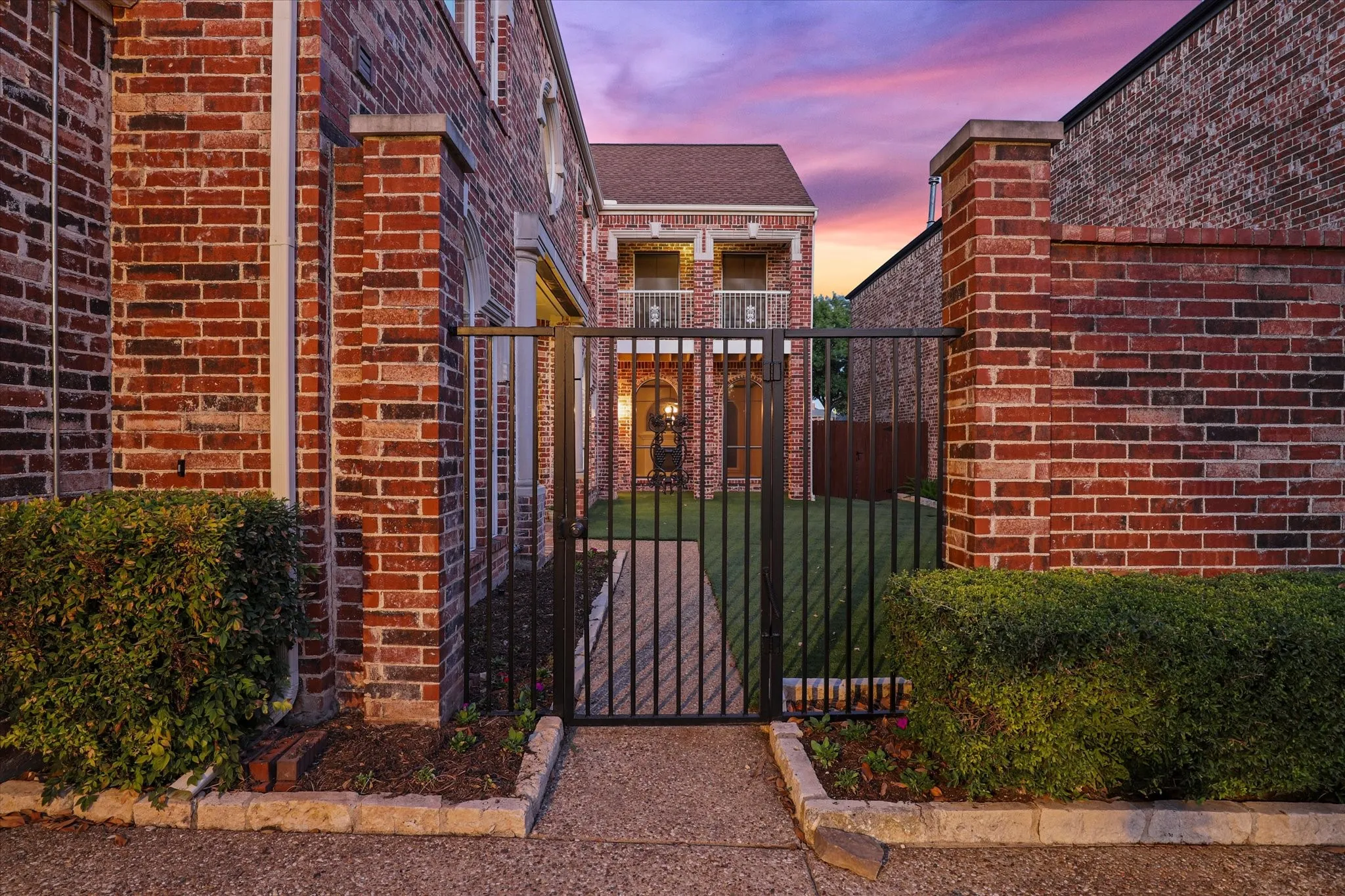 Step inside the gated and turfed courtyard.