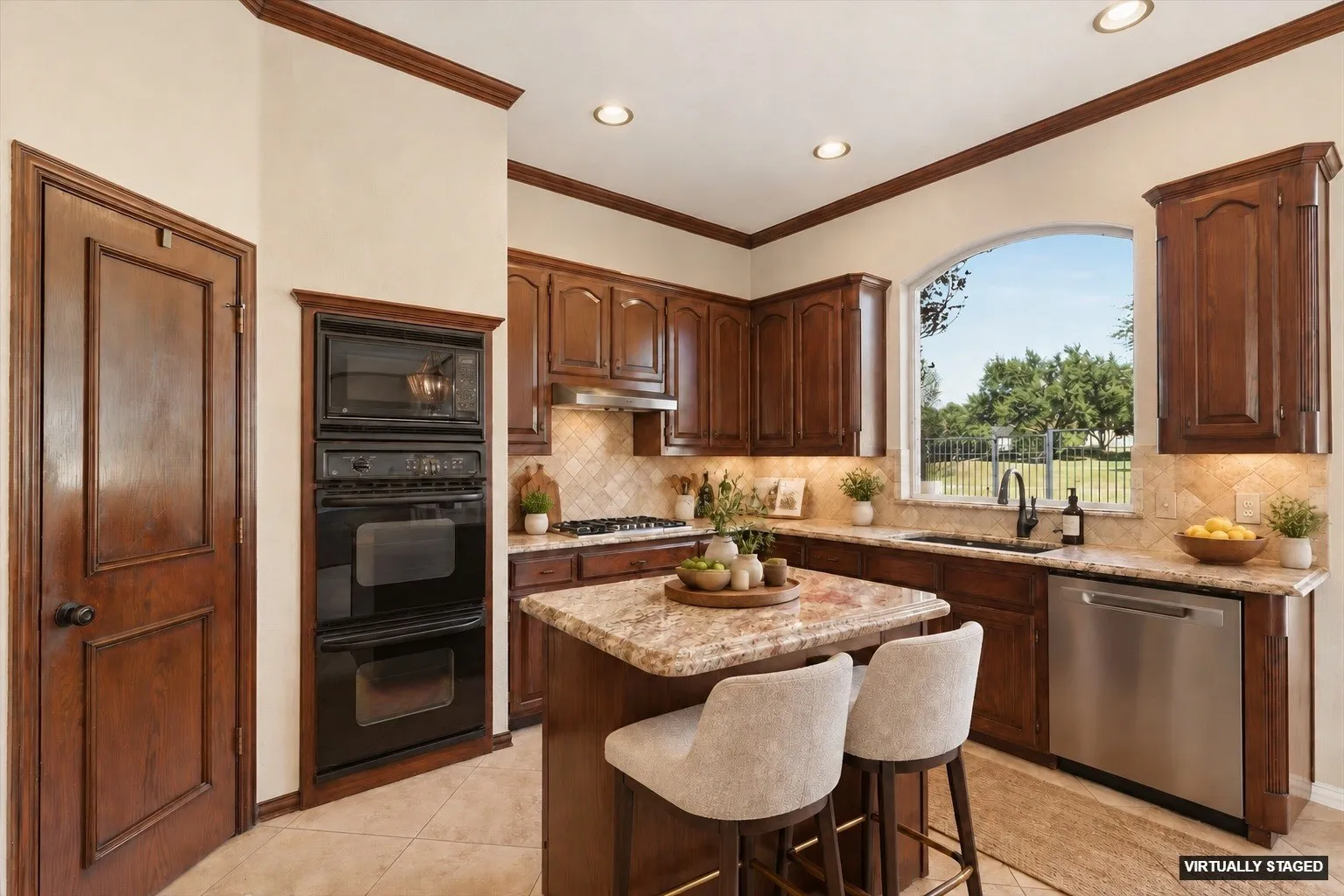 Kitchen view (virtually staged). New SS double ovens and microwave being installed soon!