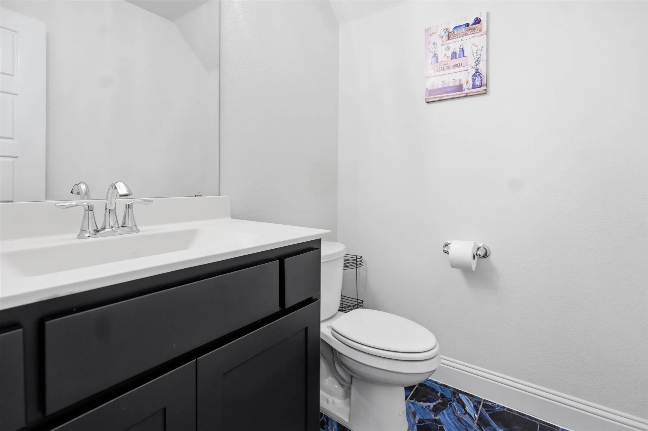 Powder Bathroom - Upstairs off of the media and game room.