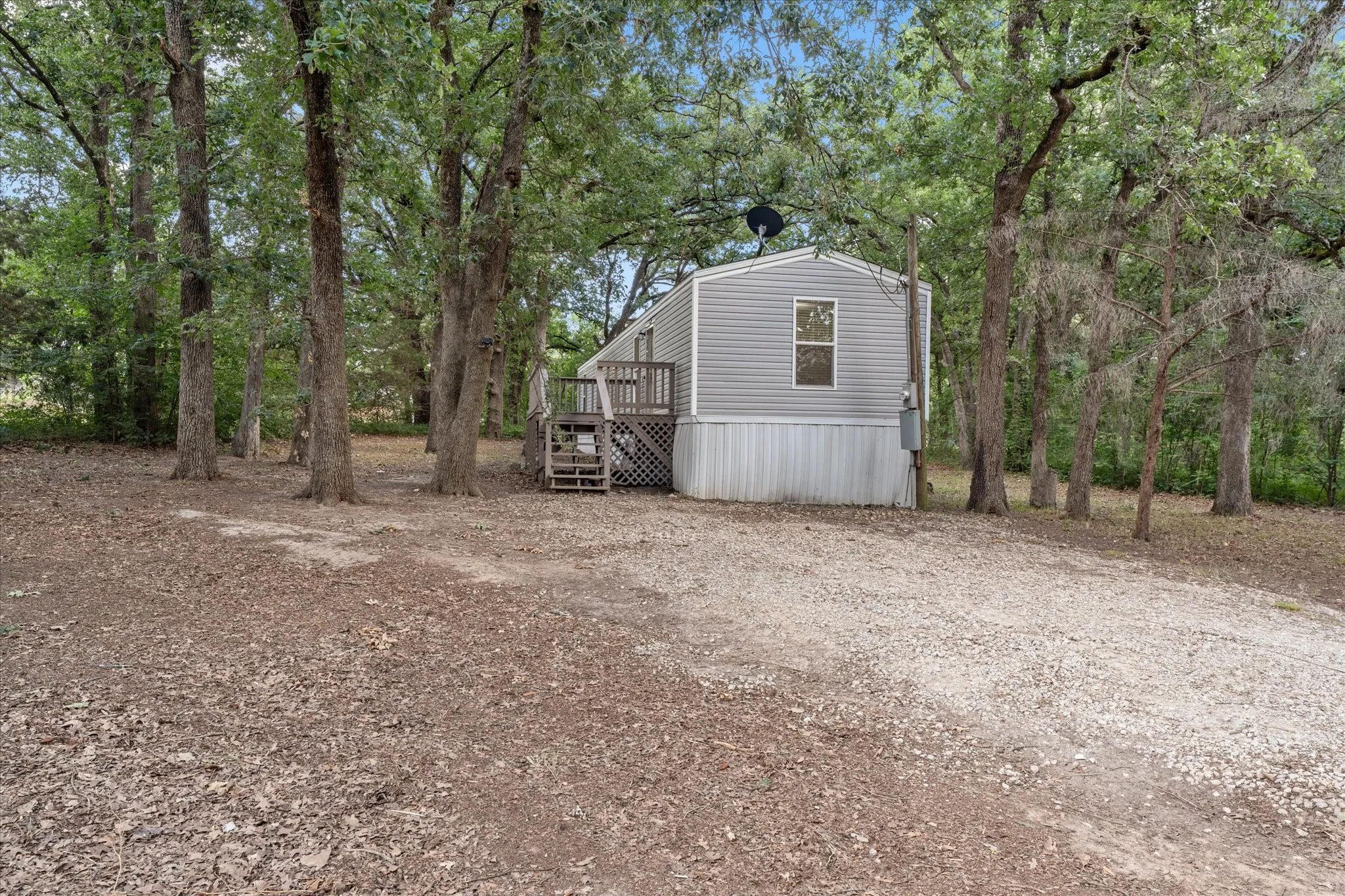 Mobile Home For Sale in Henderson County , 210 Ben Lacy Drive, Gun Barrel City, Texas 75156, 2 Bedroom, 1 Bathroom, Garage spaces, 784 Sqft, built in 2015, mls#21387924, Real Estate Agent in Gun Barrel City, Homes For Sale in Henderson county, Homes For Sale in Gun Barrel City, Realtor in Gun Barrel City Texas, Real Estate Brokerage Independent Realty Texas, Luminita Cordes Realtor