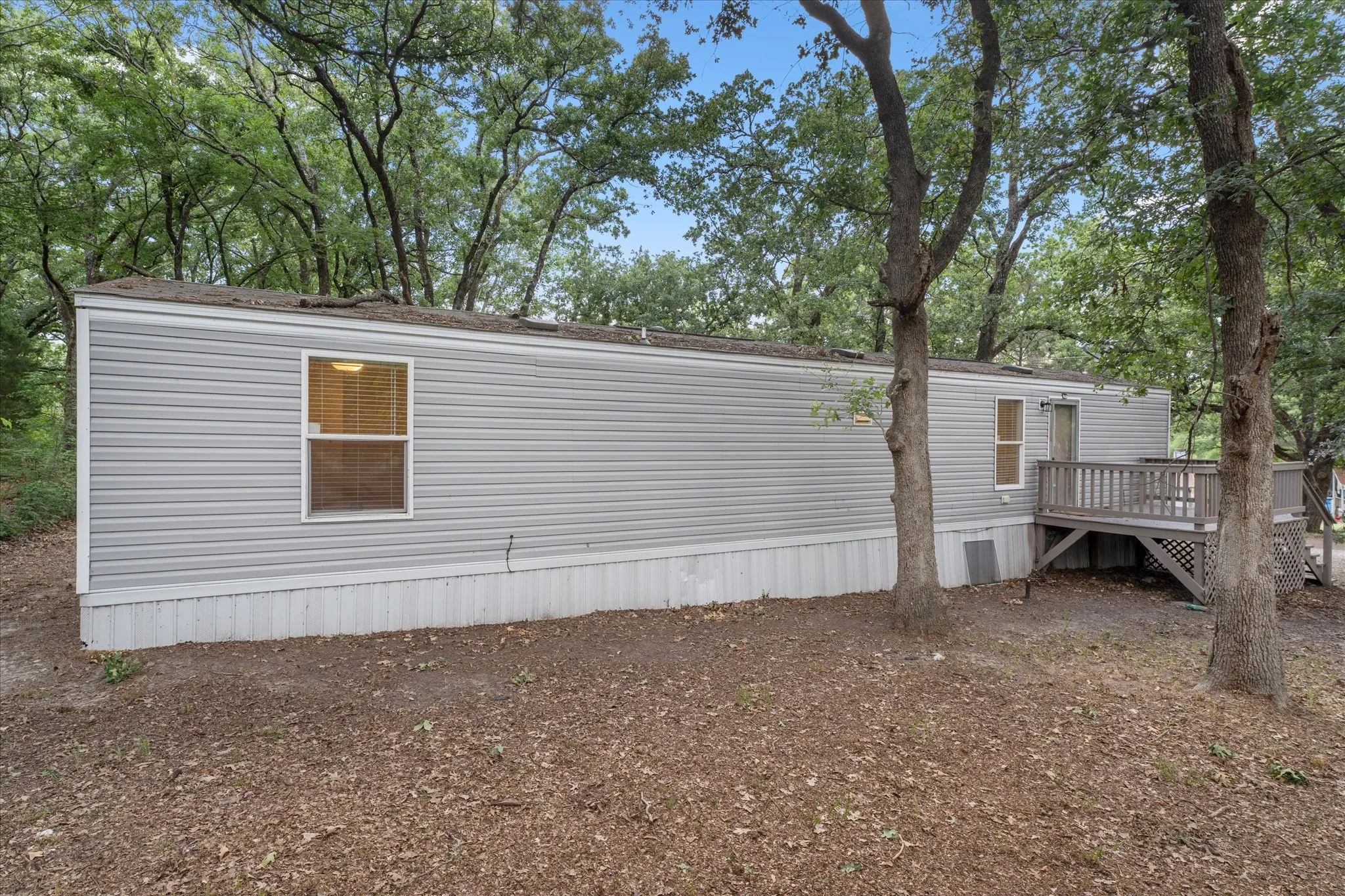 Mobile Home For Sale in Henderson County , 210 Ben Lacy Drive, Gun Barrel City, Texas 75156, 2 Bedroom, 1 Bathroom, Garage spaces, 784 Sqft, built in 2015, mls#21387924, Real Estate Agent in Gun Barrel City, Homes For Sale in Henderson county, Homes For Sale in Gun Barrel City, Realtor in Gun Barrel City Texas, Real Estate Brokerage Independent Realty Texas, Luminita Cordes Realtor