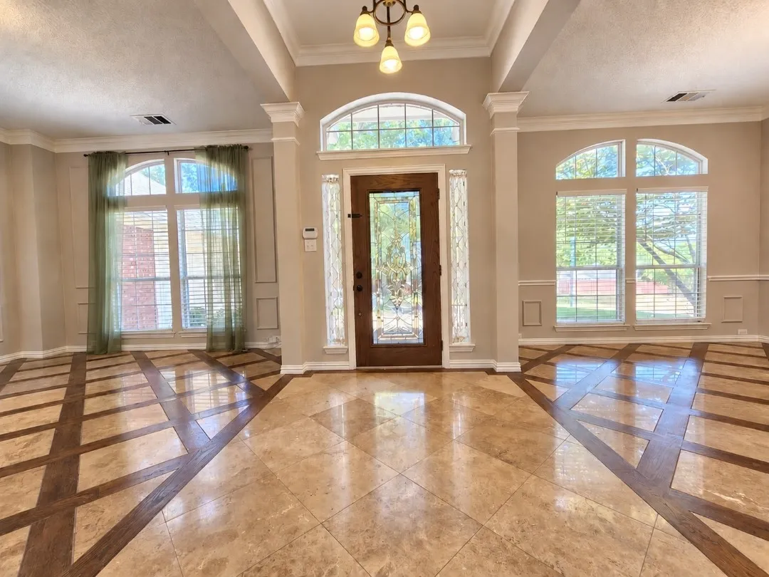 Decorative tile flooring with wood-finish inlay