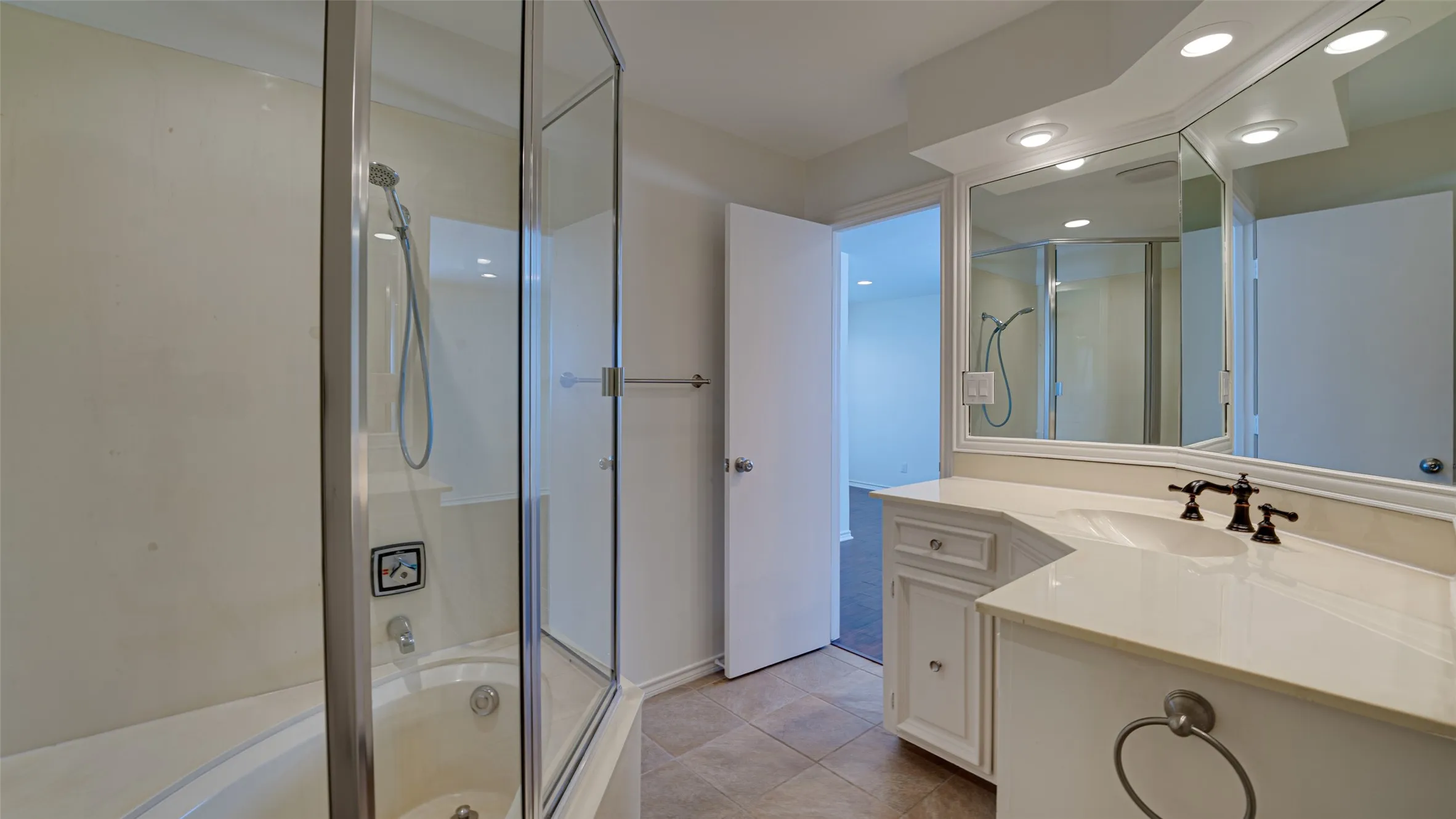 Bathroom featuring vanity and tile patterned flooring