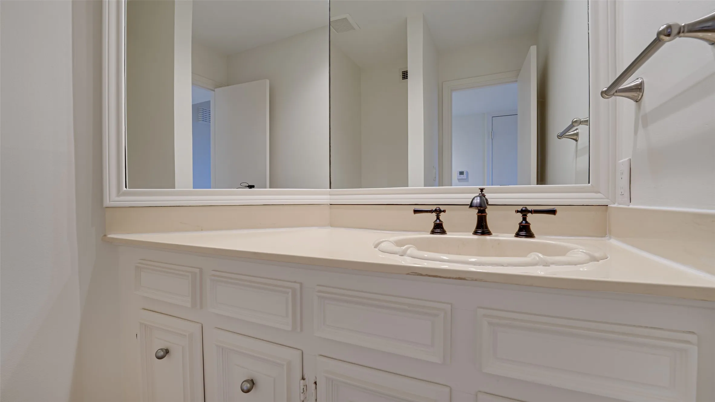 Powder bathroom featuring vanity