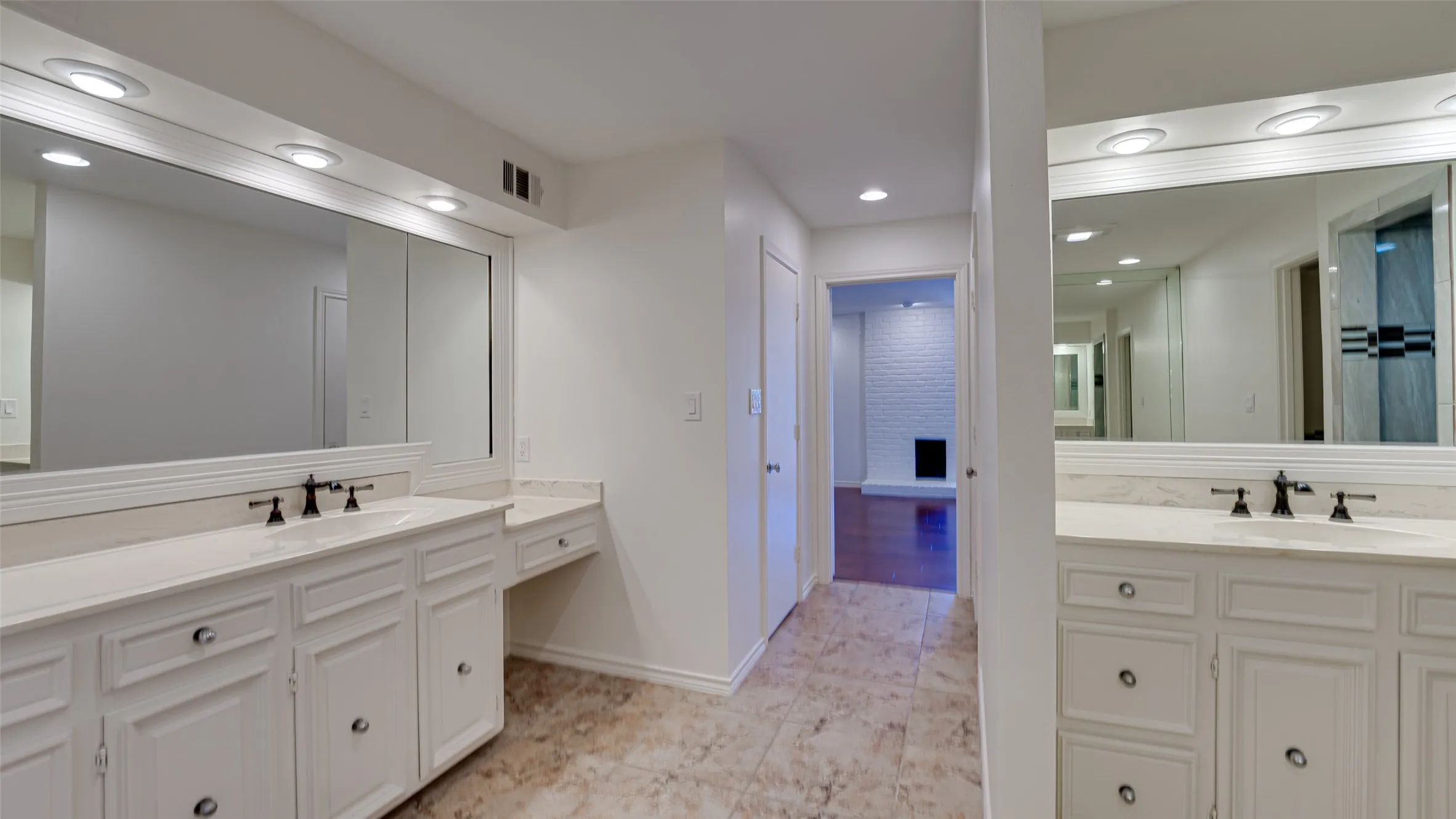 Bathroom with vanity and tile patterned flooring