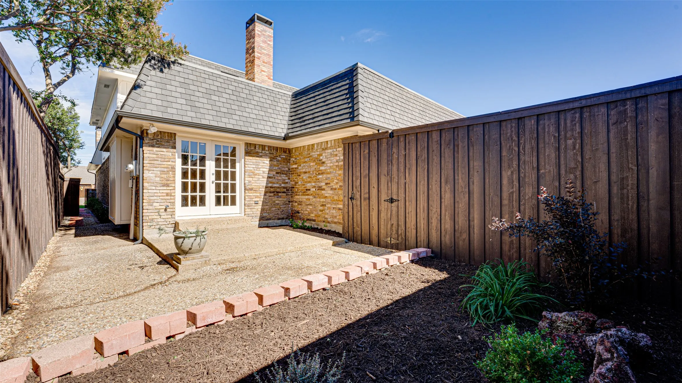 Rear view of property with a patio area