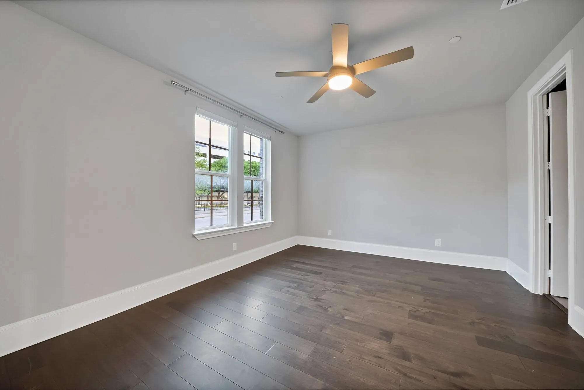 Wood-finish flooring with crisp white trim