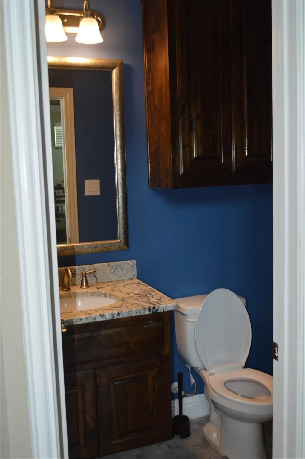 Bathroom with vanity and tile patterned flooring