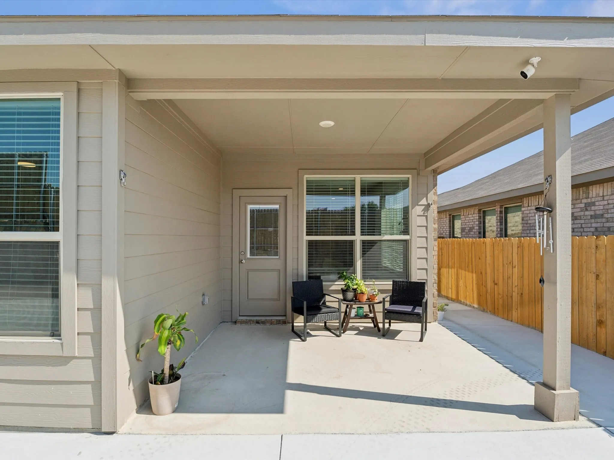 Covered patio featuring a concrete slab and direct access to the interior