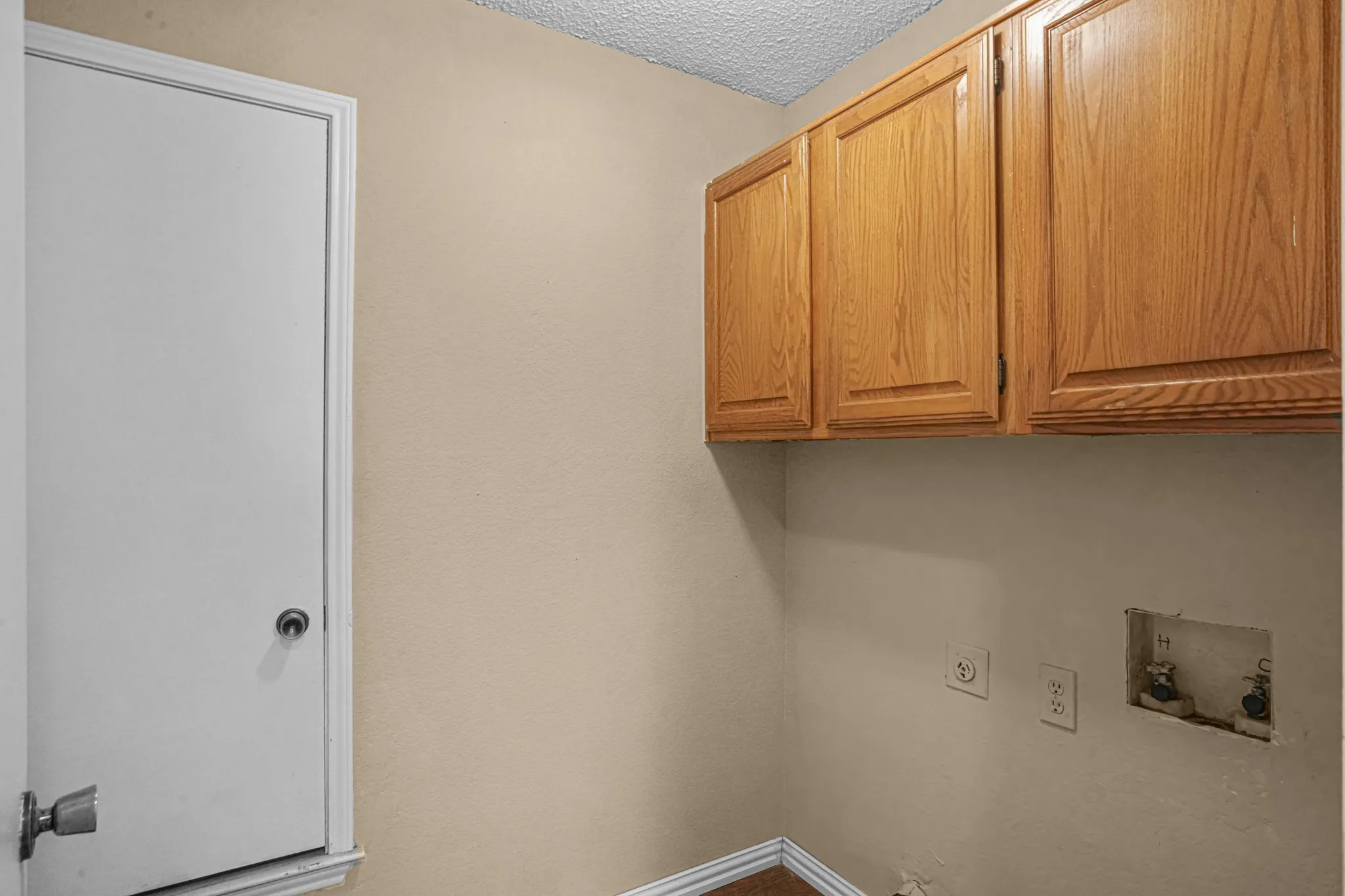 Cabinet storage in the laundry room