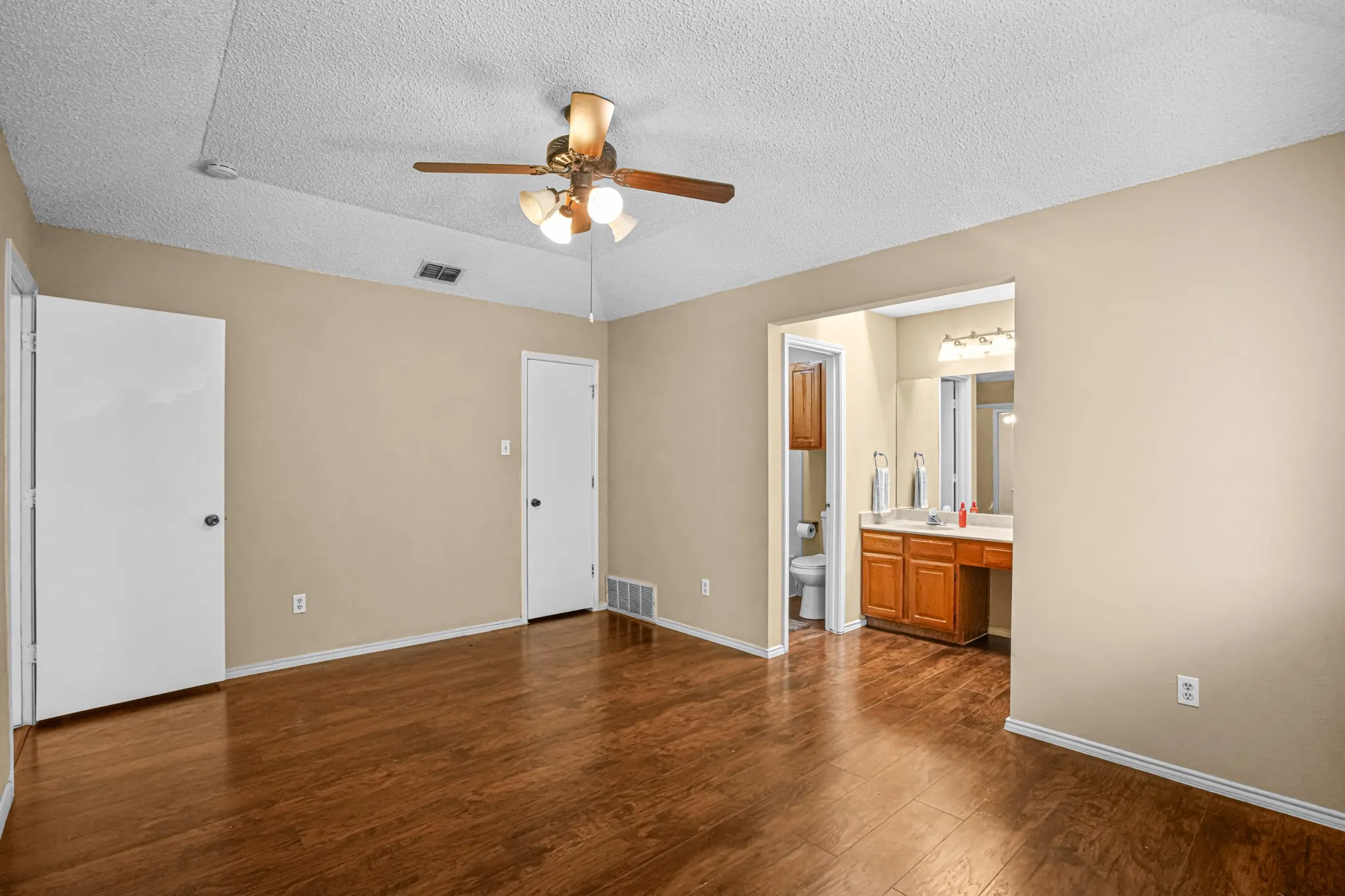 Master bathroom vanity is seperate from toilet and shower/ tub combo