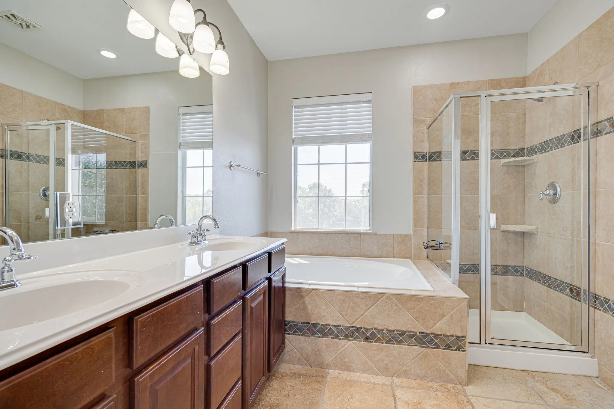 Master Bathroom features separate shower and garden tub.