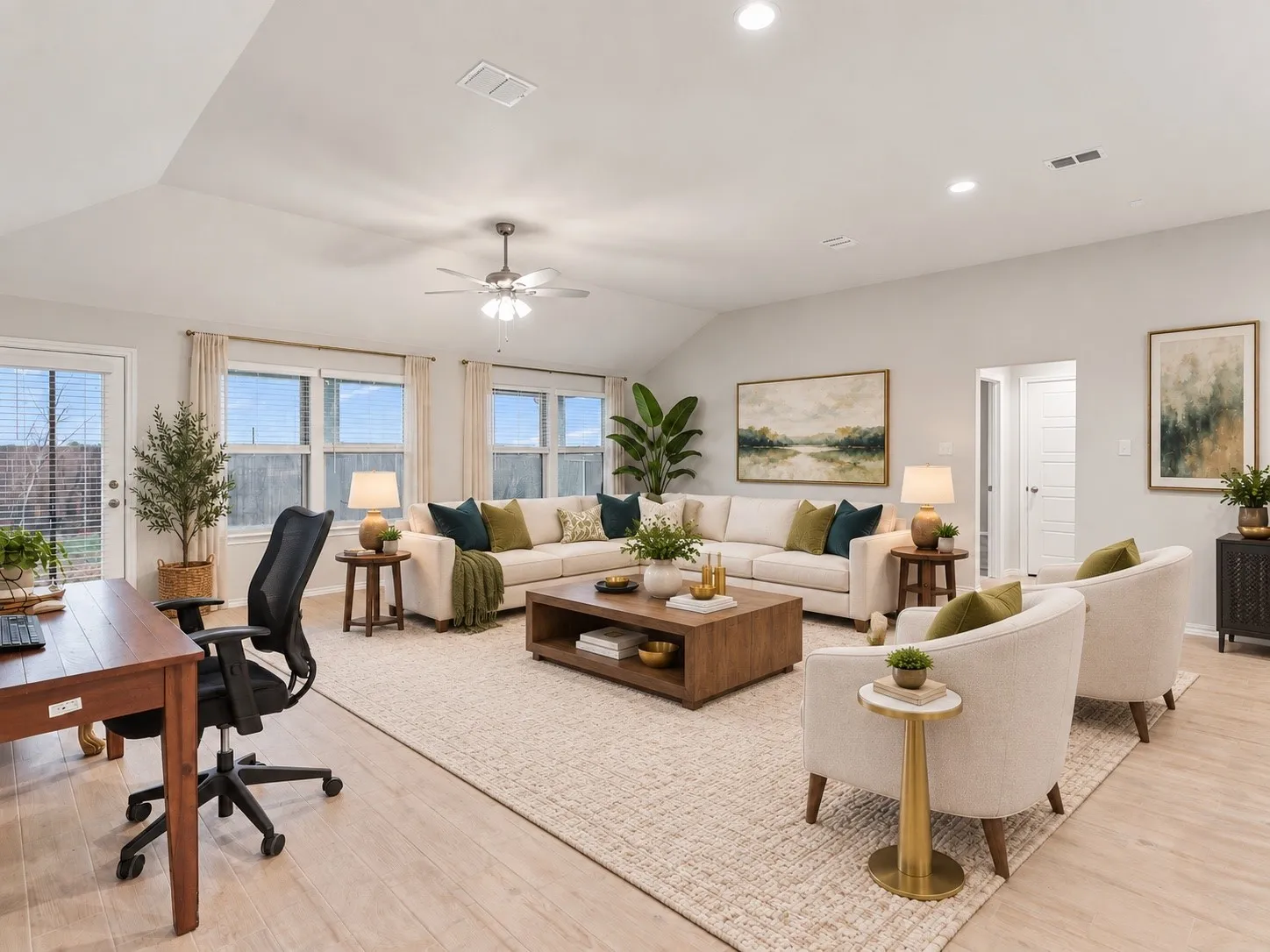 Vaulted ceiling, recessed lighting, wood-finish flooring, ceiling fan, and multiple windows