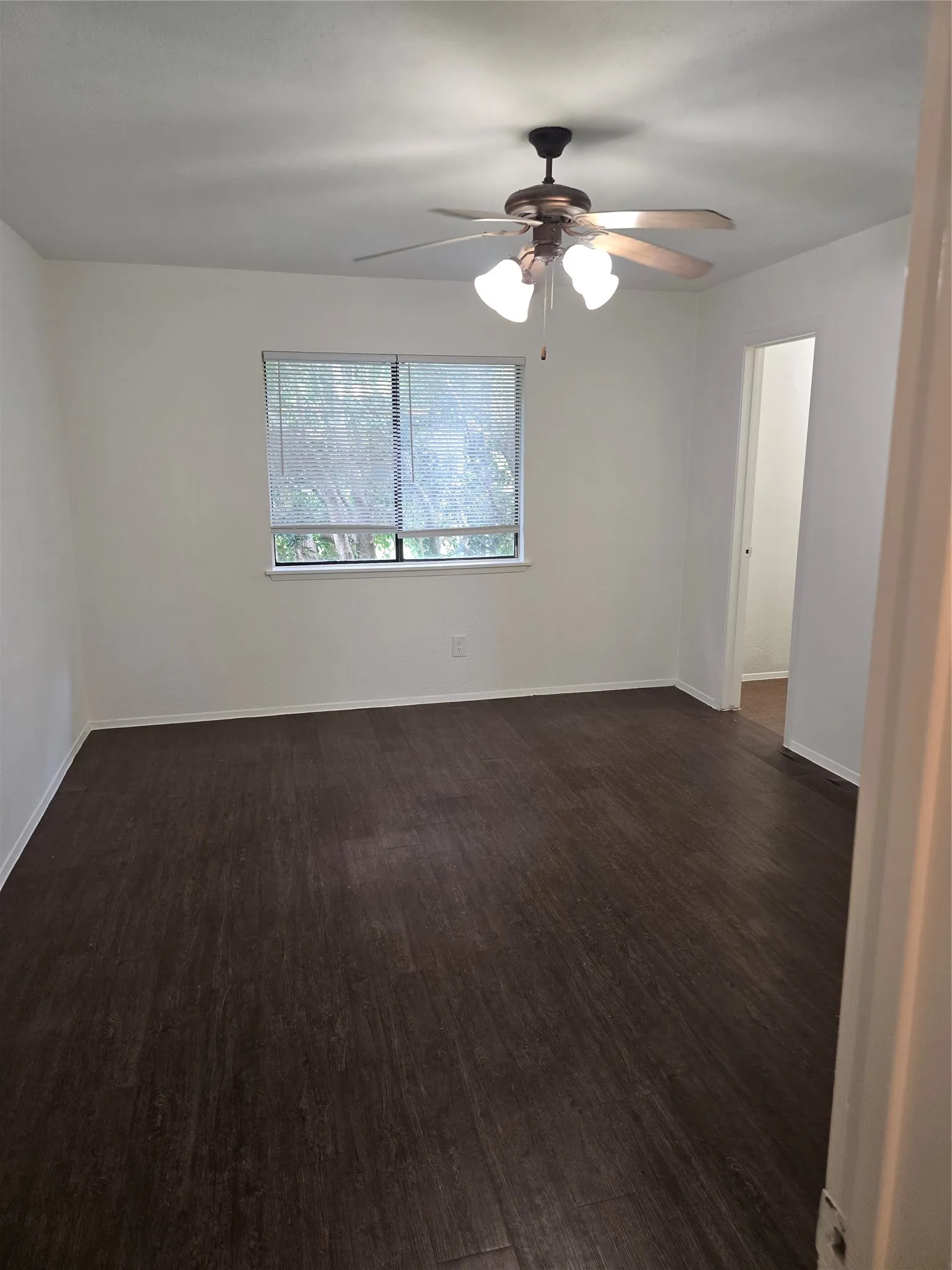 View of bedroom from closet. That other doorway leads to the master bath.