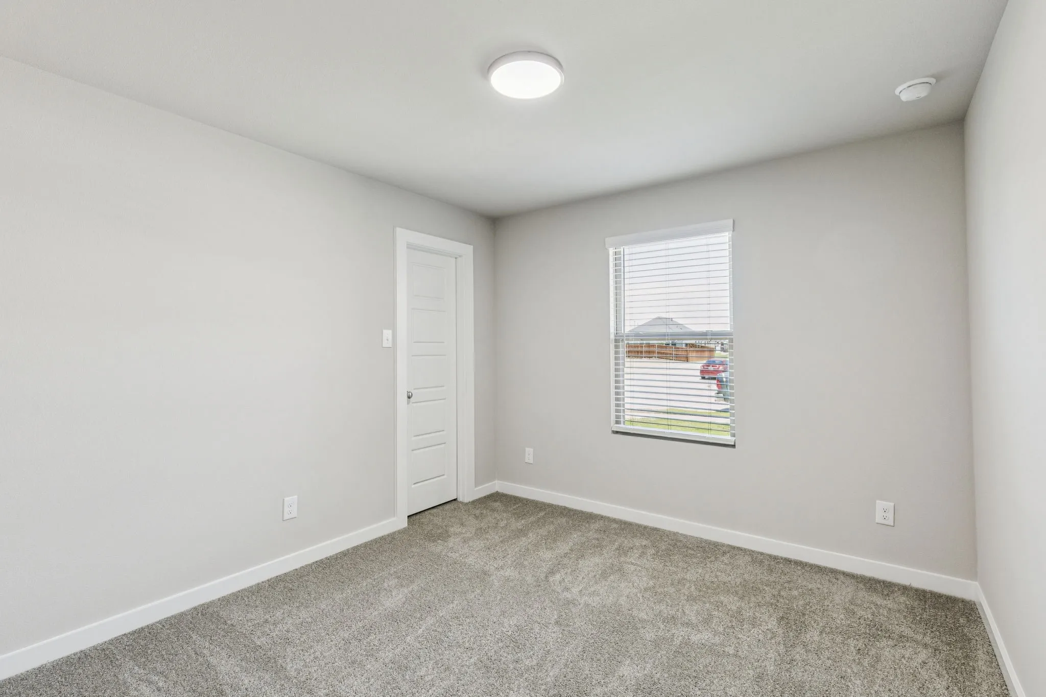 Bedroom in the Harper home plan by Trophy Signature Homes – REPRESENTATIVE PHOTO