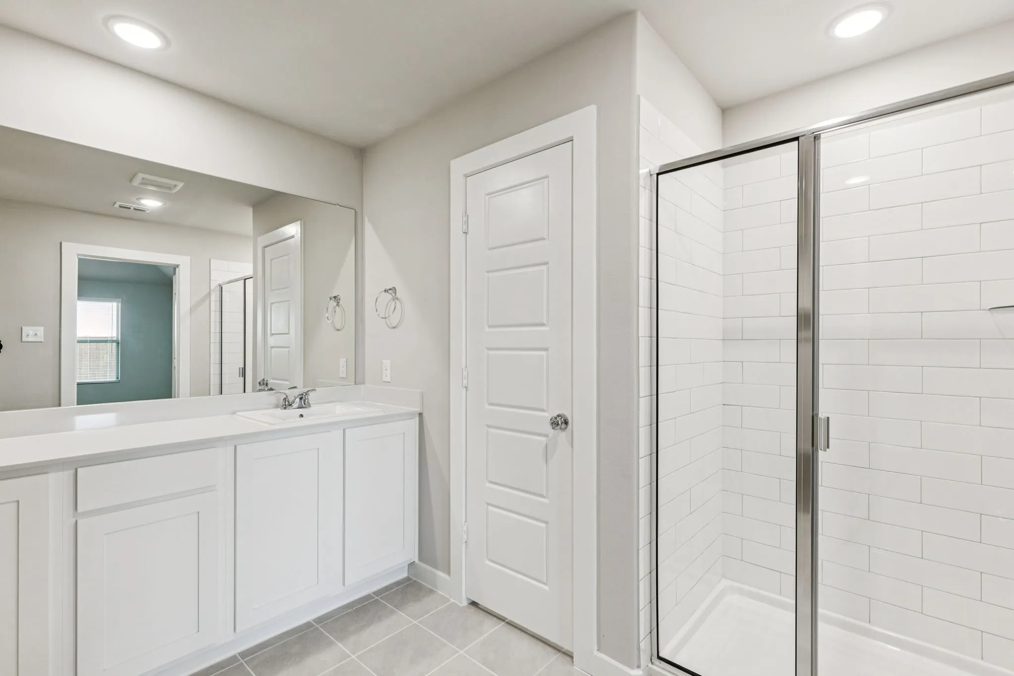 Primary Bathroom in the Harper home plan by Trophy Signature Homes – REPRESENTATIVE PHOTO