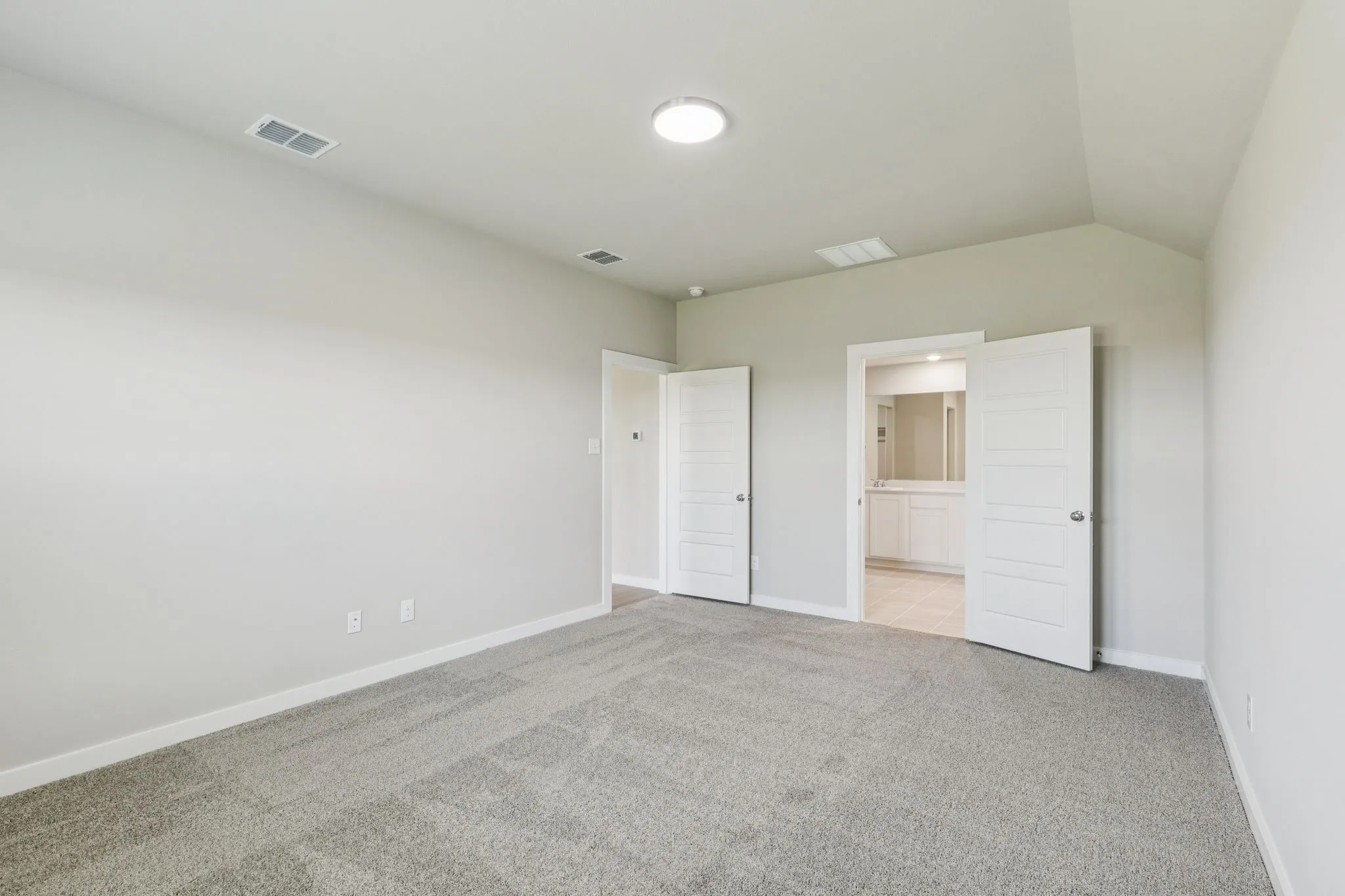 Primary Suite in the Harper home plan by Trophy Signature Homes – REPRESENTATIVE PHOTO