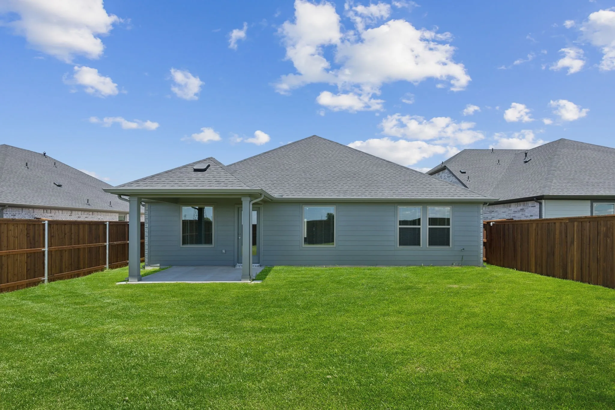 Patio in the Harper home plan by Trophy Signature Homes – REPRESENTATIVE PHOTO