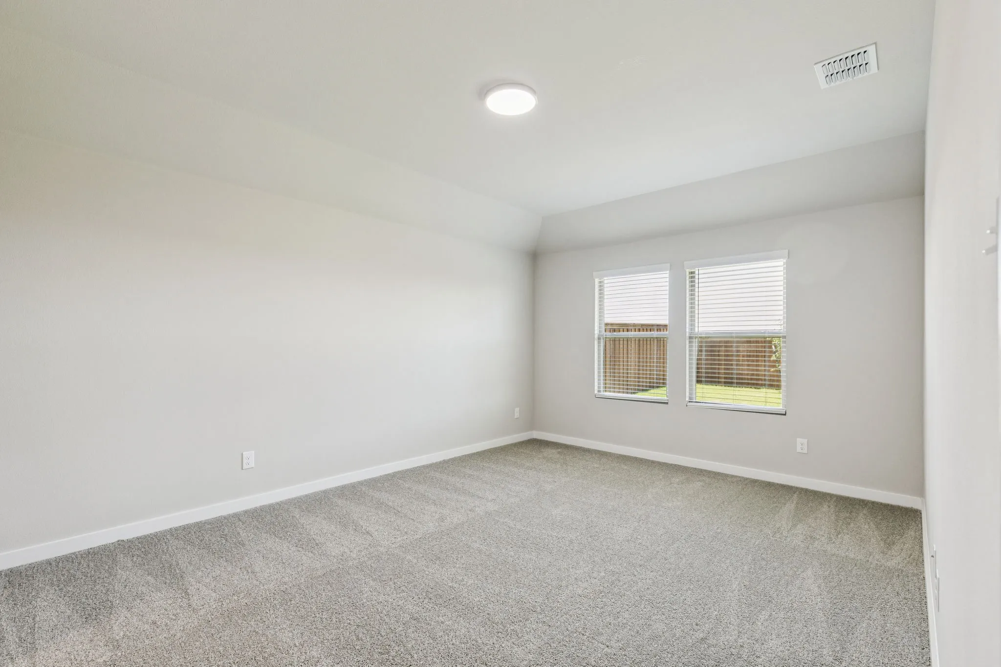 Primary Suite in the Harper home plan by Trophy Signature Homes – REPRESENTATIVE PHOTO