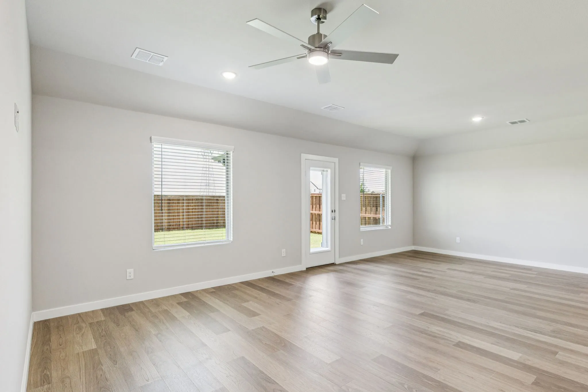 Living Room in the Harper home plan by Trophy Signature Homes – REPRESENTATIVE PHOTO