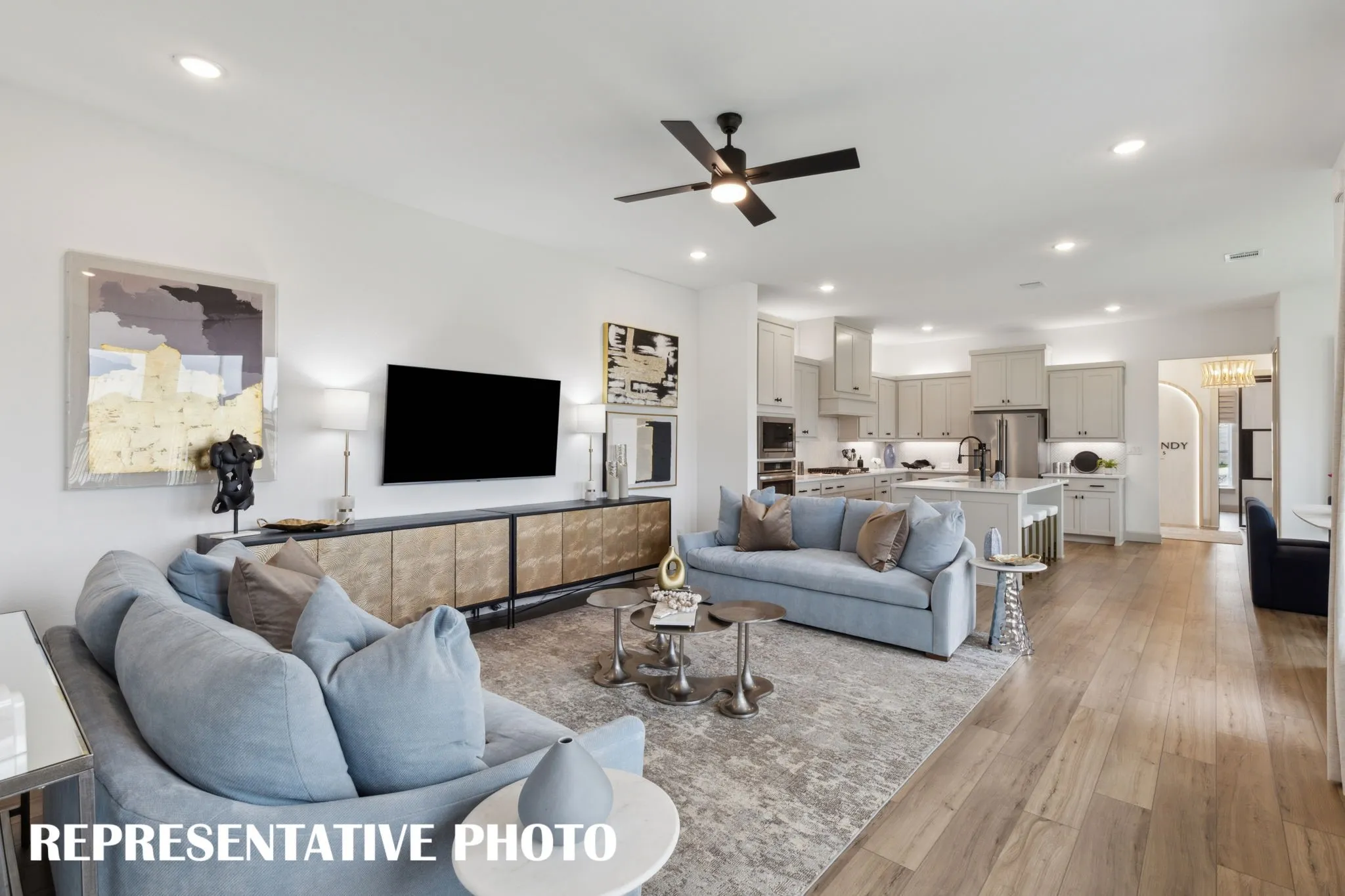 The open and flowing main level in our Madeleine plan makes this the perfect family home.  REPRESENTATIVE PHOTO