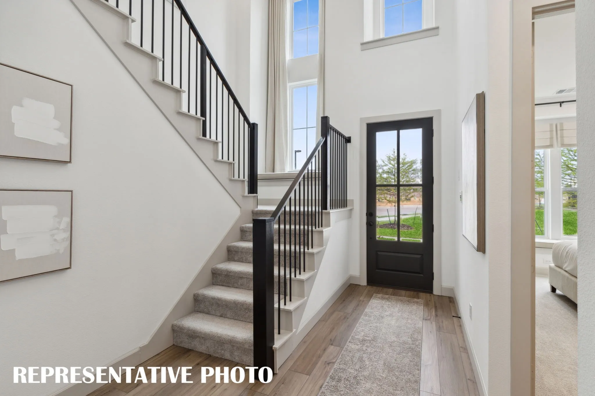 Our Madeleine plan offers a stunning, light filled main entry designed to impress!  REPRESENTATIVE PHOTO