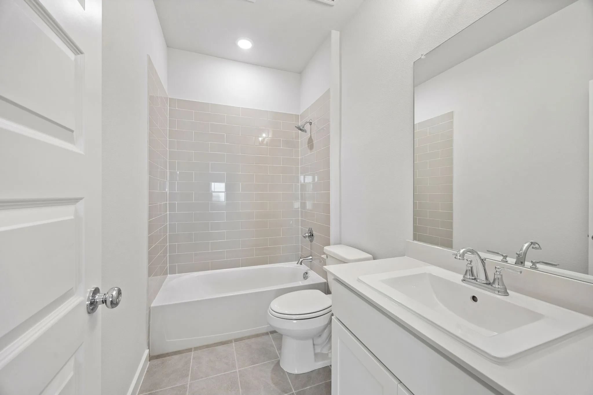 Bathroom in the Wimbledon home plan by Trophy Signature Homes – REPRESENTATIVE PHOTO