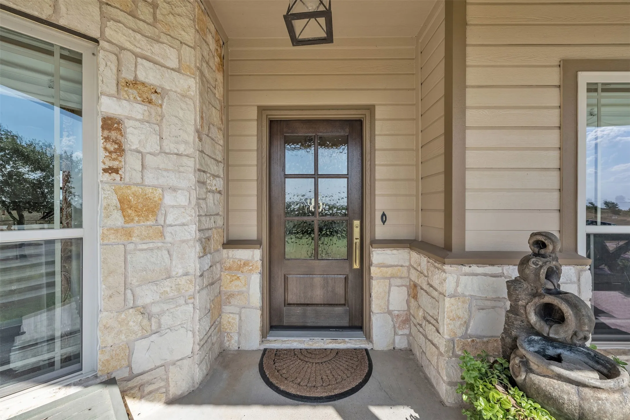 Stone facade with horizontal siding accents