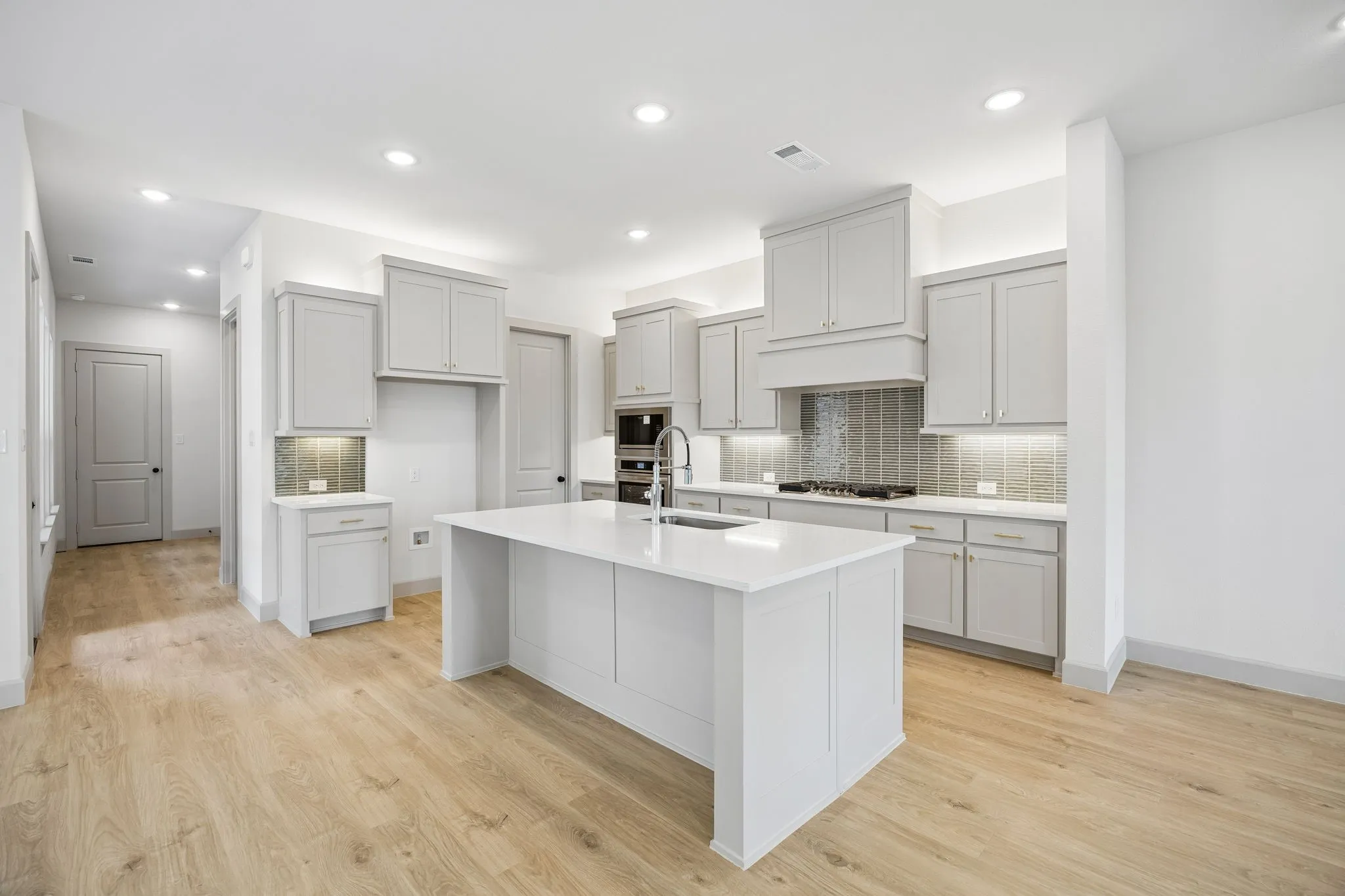 No shortage of style or space in this chef's dream kitchen!