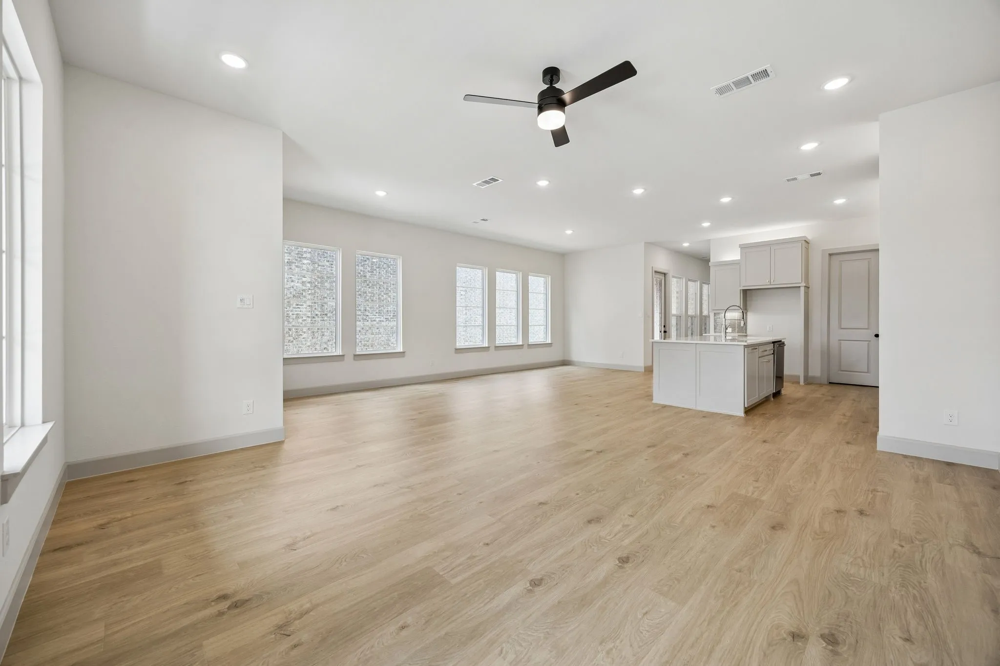Whether it's grand dinner parties or cozy family meals, this light filled dining room is the perfect place for you to entertain.