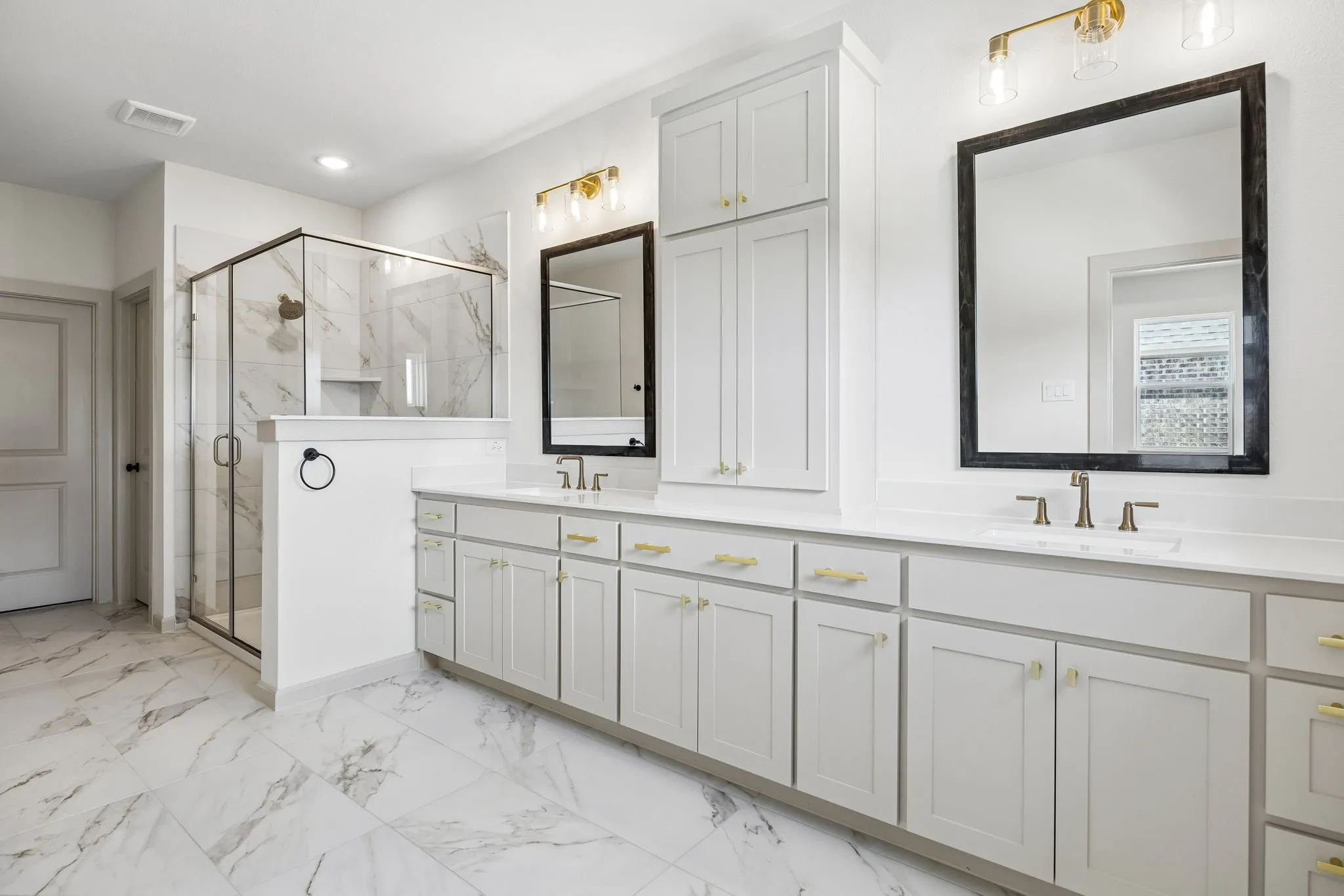 Filled with style, sophistication and space, this fantastic Owner's bath was built for two!