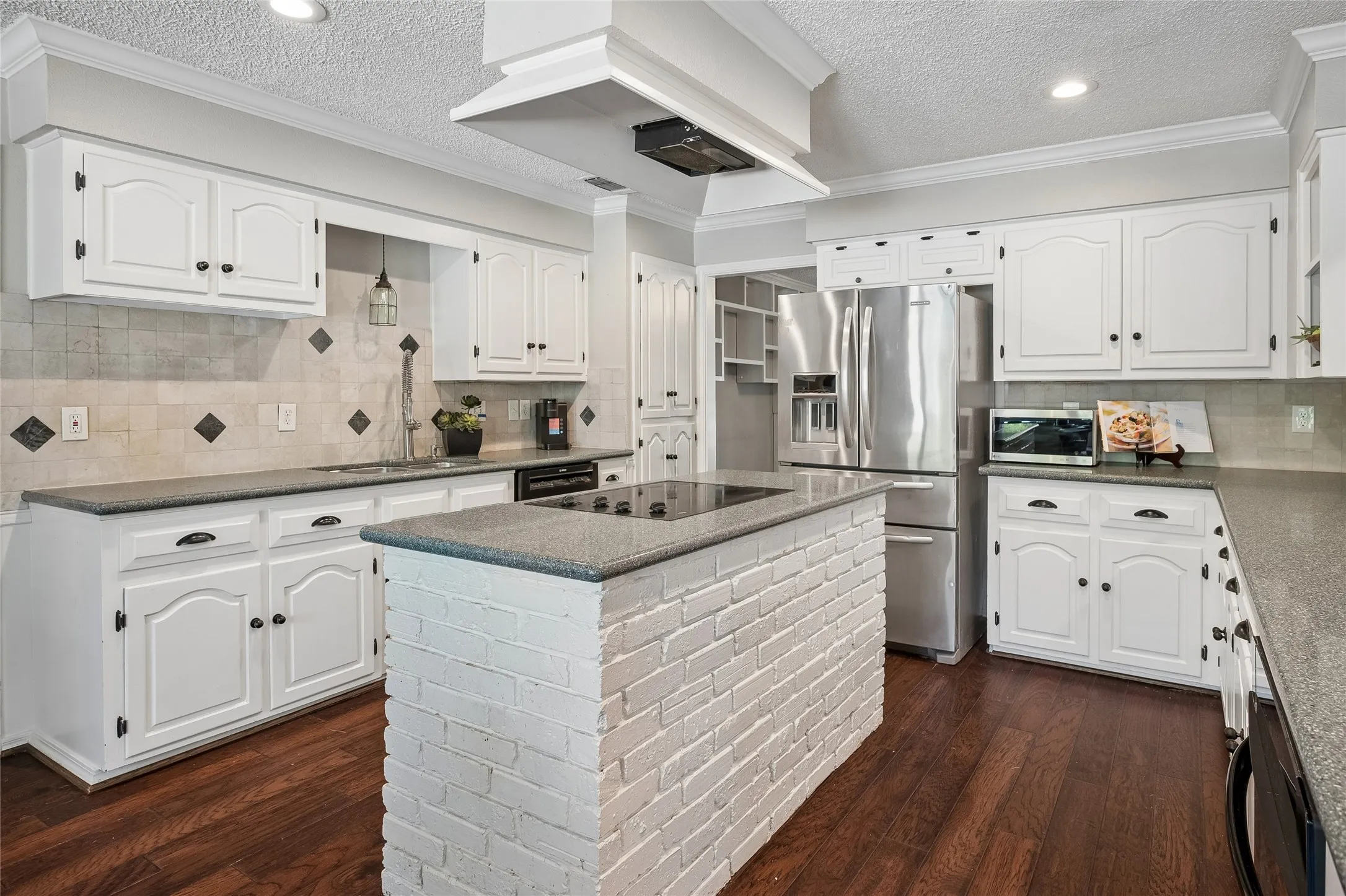 Lots  of counter space and cabinets.
