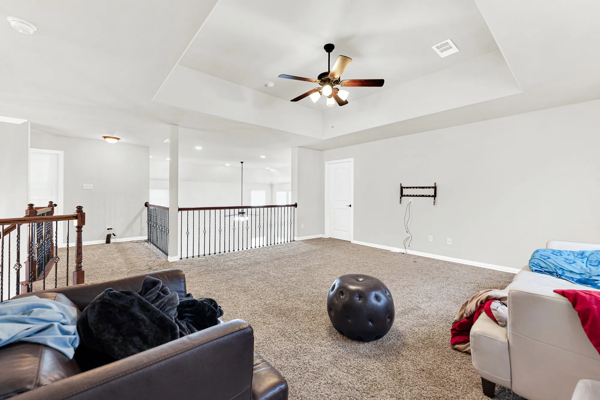 Wide open floor space seamlessly bridges the upper stair landing and adjacent bonus rooms. Imagine setting up a ping-pong table or play zone where kids can run free on rain-checked afternoons