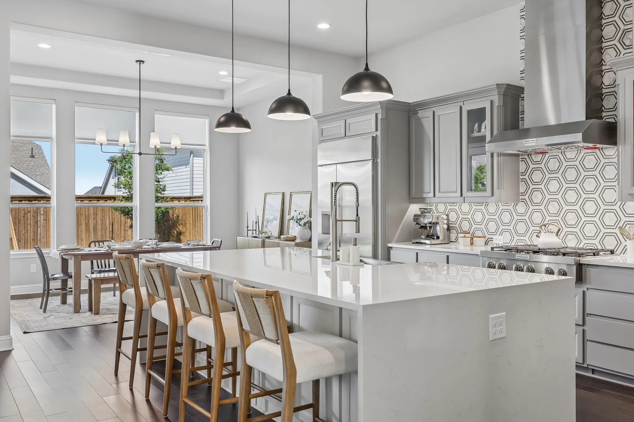 Features include massive chef's kitchen, featuring a breathtaking 9.9-foot x 5.2-foot Calacatta quartz waterfall island, abundant workspace, a gigantic walk-in pantry, and a premium $14,000 GE refrigerator with a lifetime warranty included.