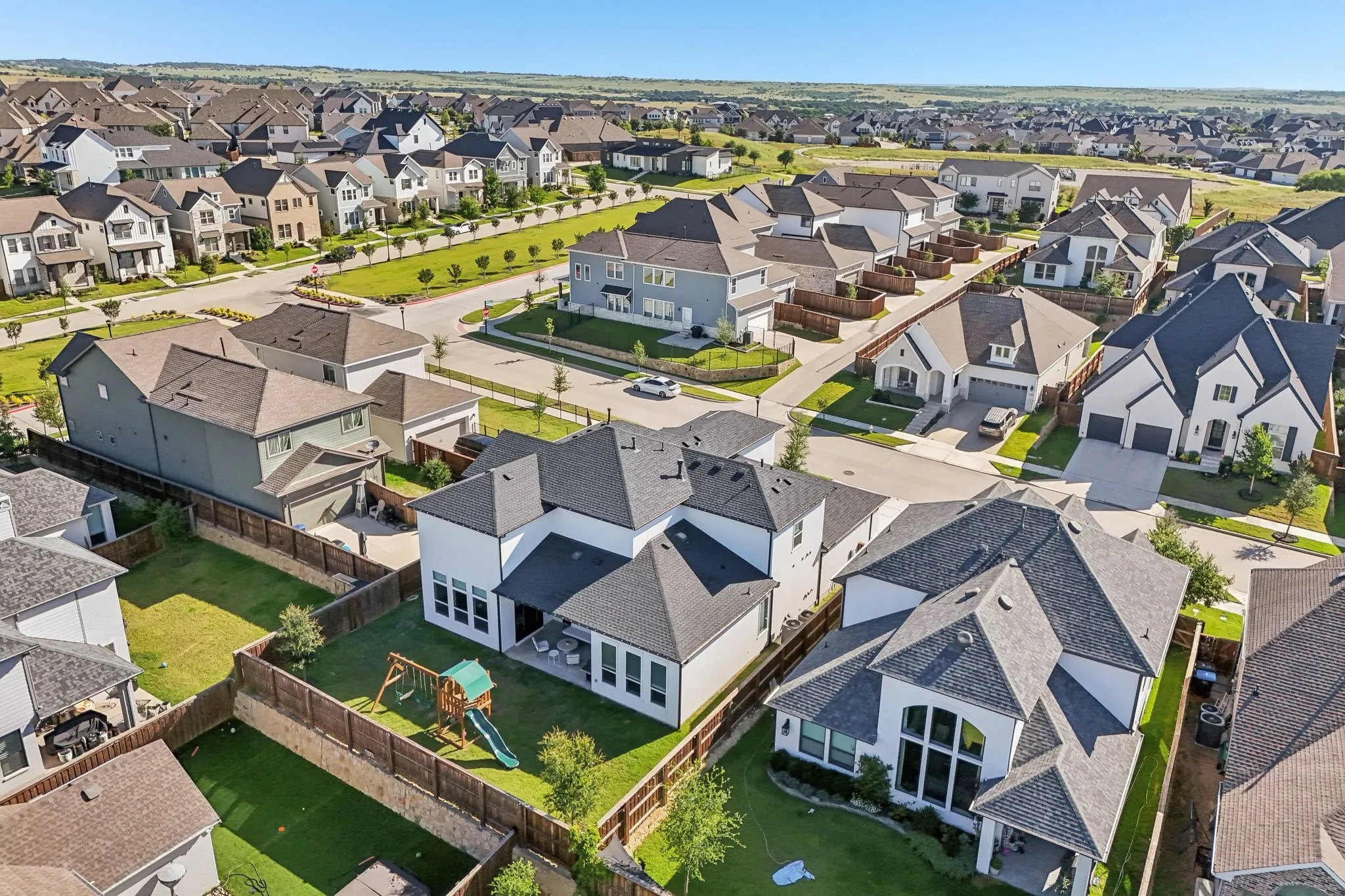 Aerial view of home with play set