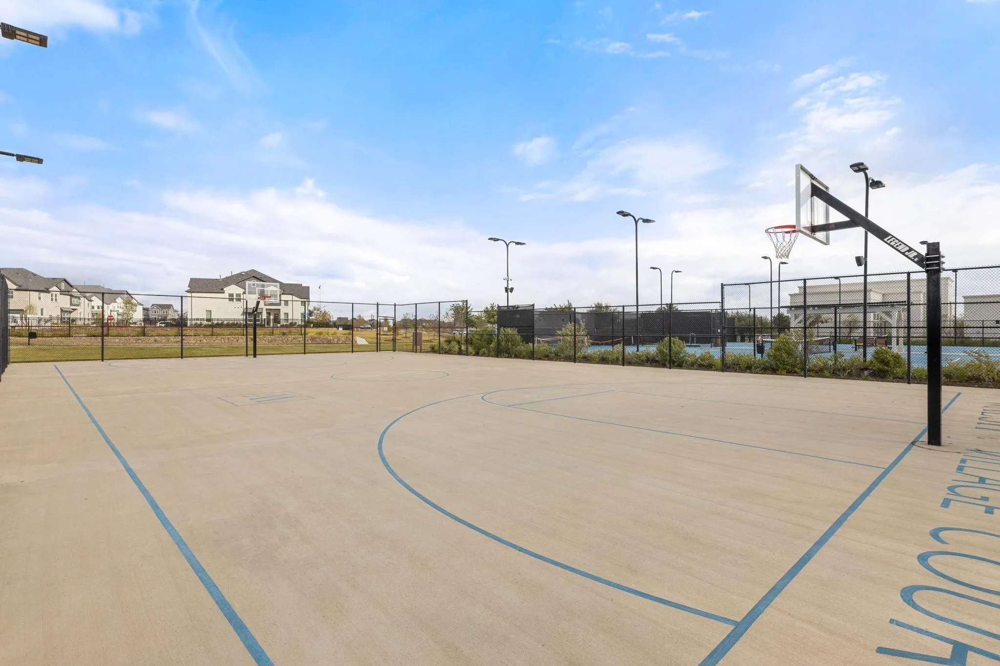Basketball Court - also has a sand volleyball court, pickleball/tennis court, Makerspace, community garden, and more!