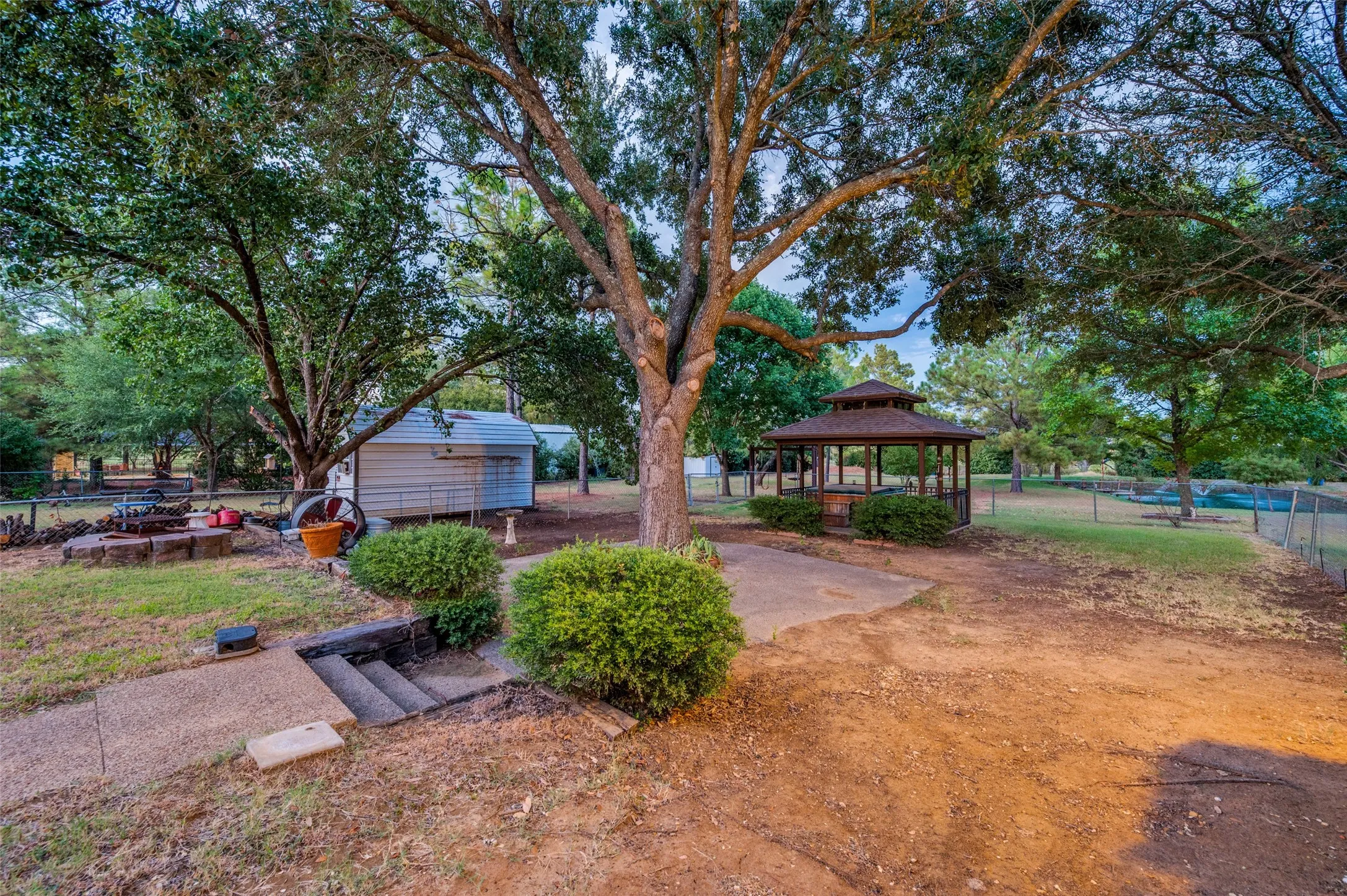 So much room to spread out and entertain with the gazebo and fire pit