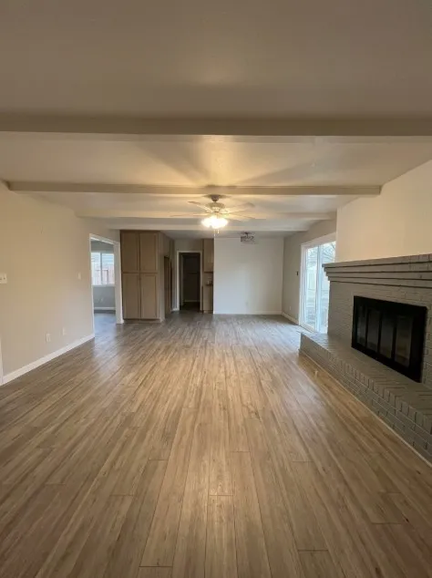 Another view of living room area (with no furniture).