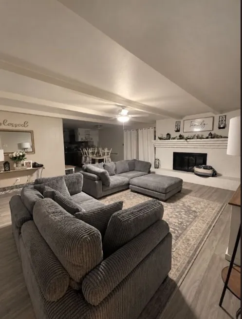 Nice open living room area with great fireplace.