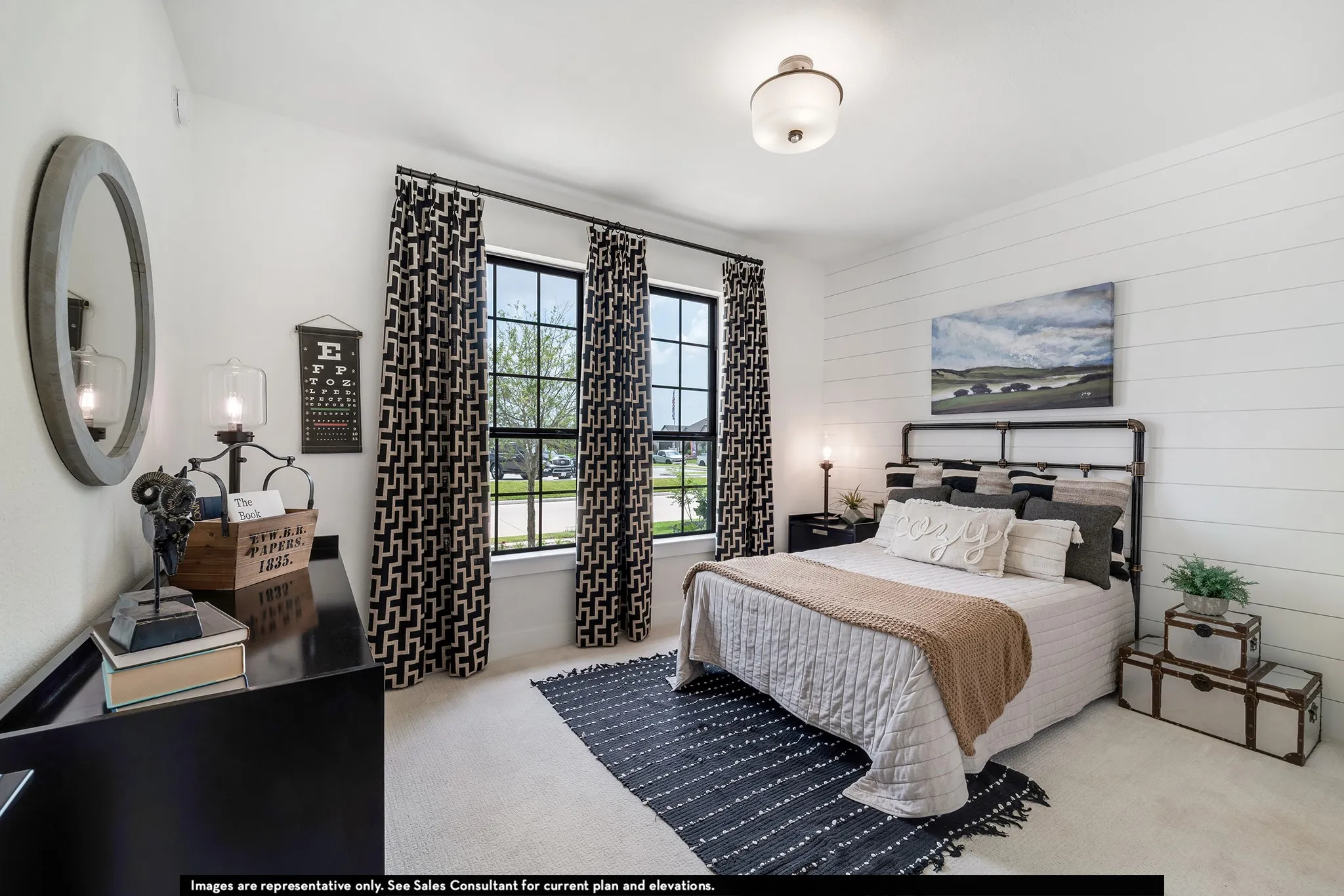 White shiplap accent wall, two large windows with black frames, overhead semi-flush mount light fixture, and light-toned carpeting