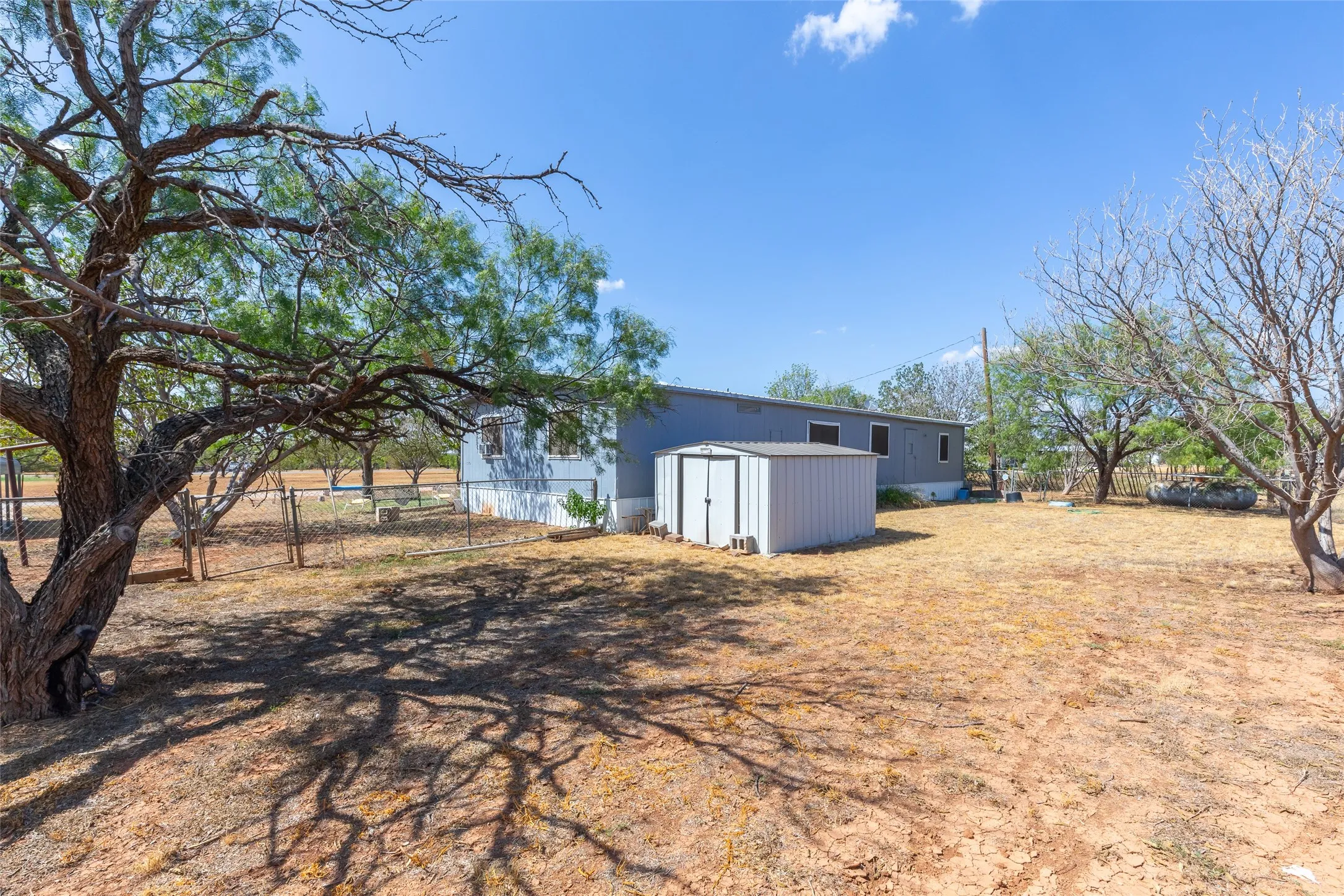 Mobile Home For Sale in Taylor County , 1455 County Road 401, Merkel, Texas 79536, 4 Bedroom, 2 Bathroom, Garage spaces, 1,440 Sqft, built in 1979, mls#21388303, Real Estate Agent in Merkel, Homes For Sale in Taylor county, Homes For Sale in Merkel, Realtor in Merkel Texas, Real Estate Brokerage Independent Realty Texas, Luminita Cordes Realtor