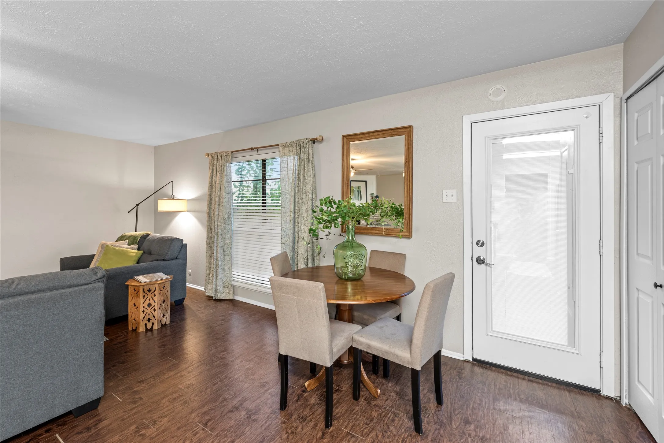 Wood-finish flooring throughout, offering a cohesive aesthetic
