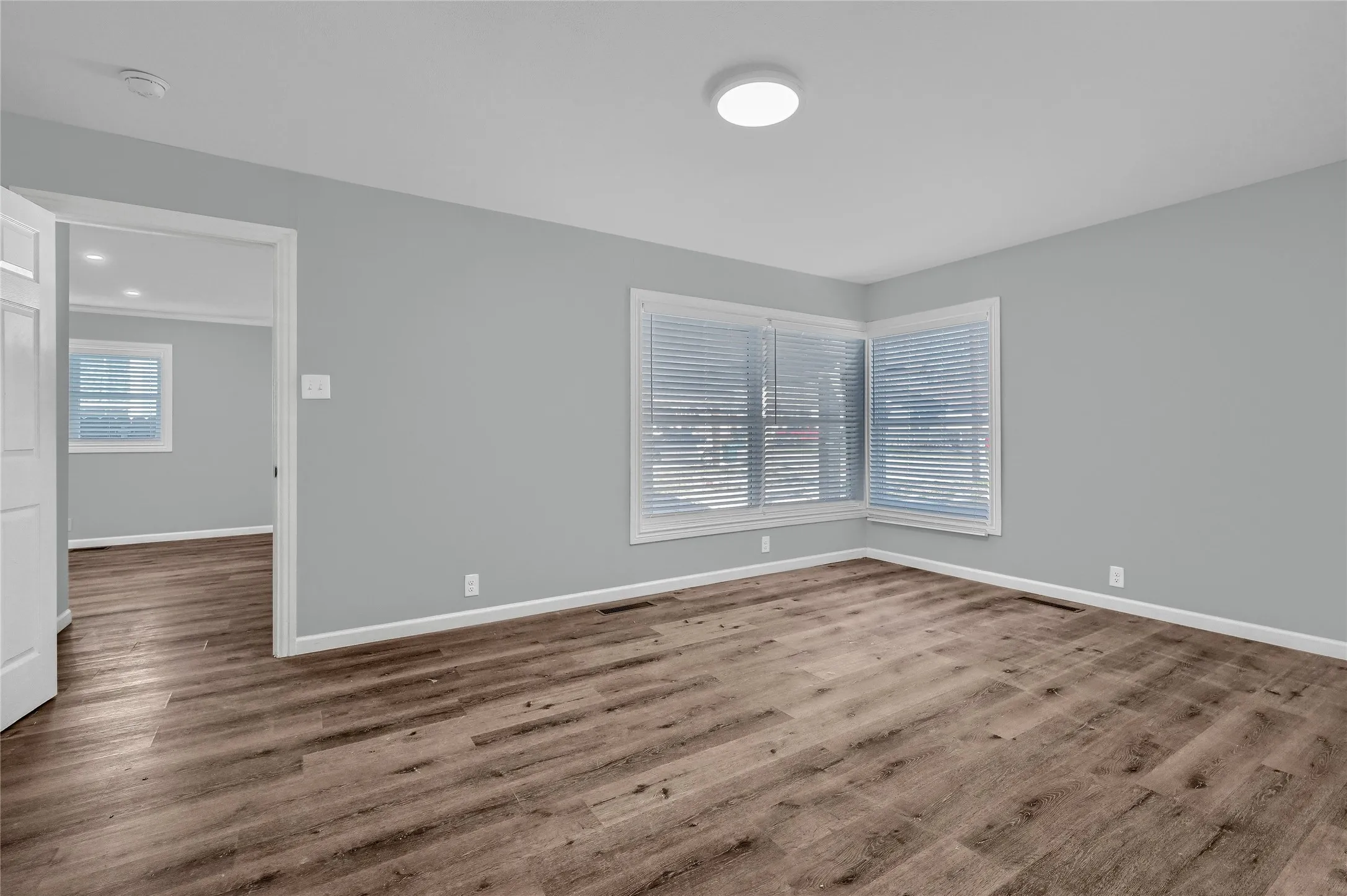 Empty room with wood-type flooring