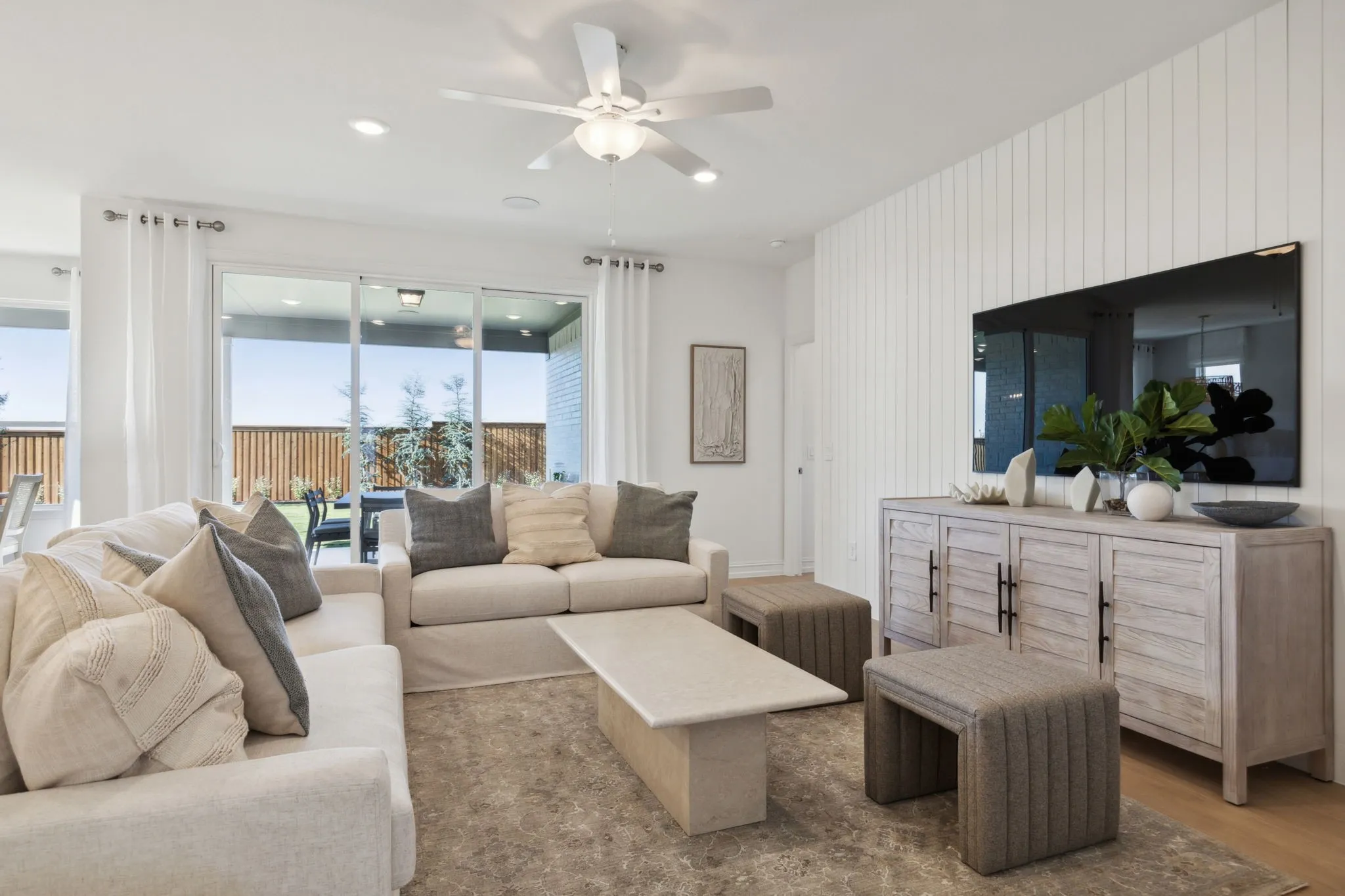 *Model Representation - Spacious gathering room with large windows