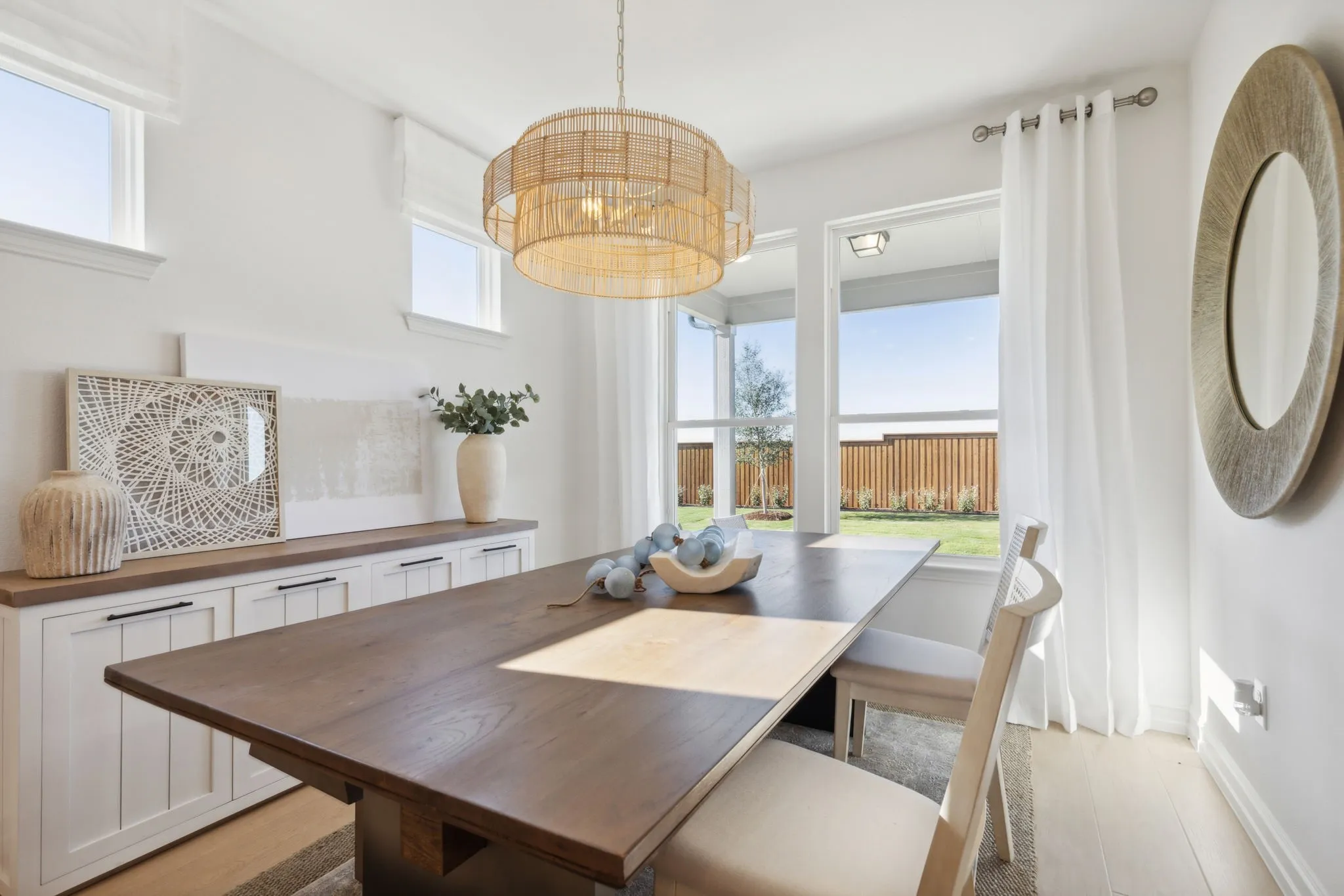 *Model Representation - Dining area off kitchen with large windows