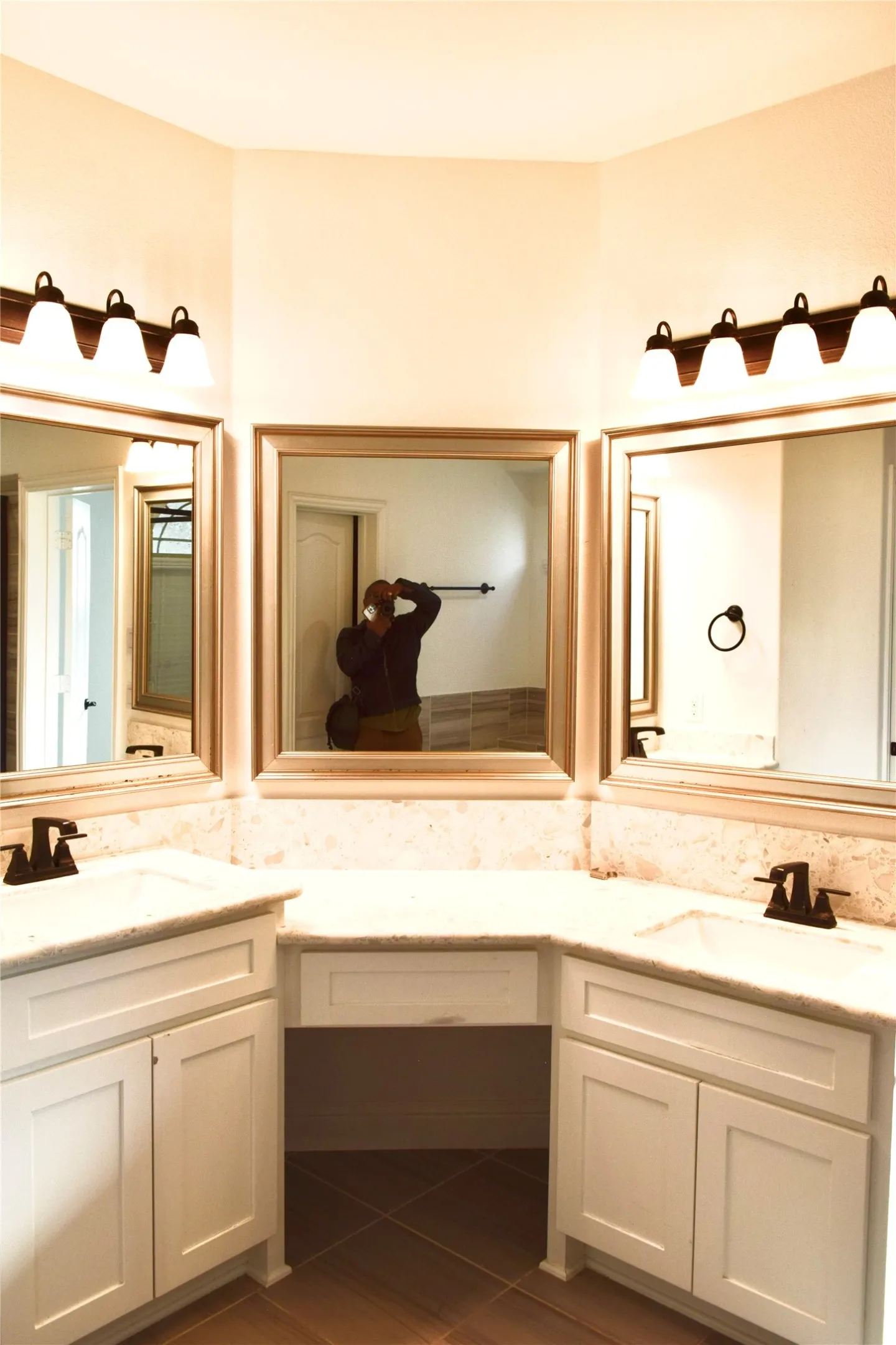 Bathroom with tile patterned flooring and vanity