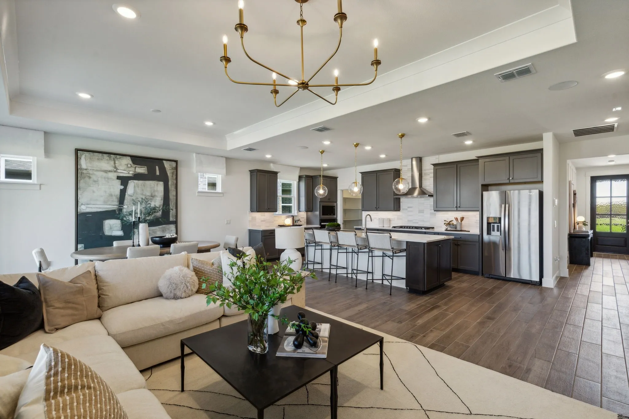 *Model Representation - Gathering room with view of main living areas