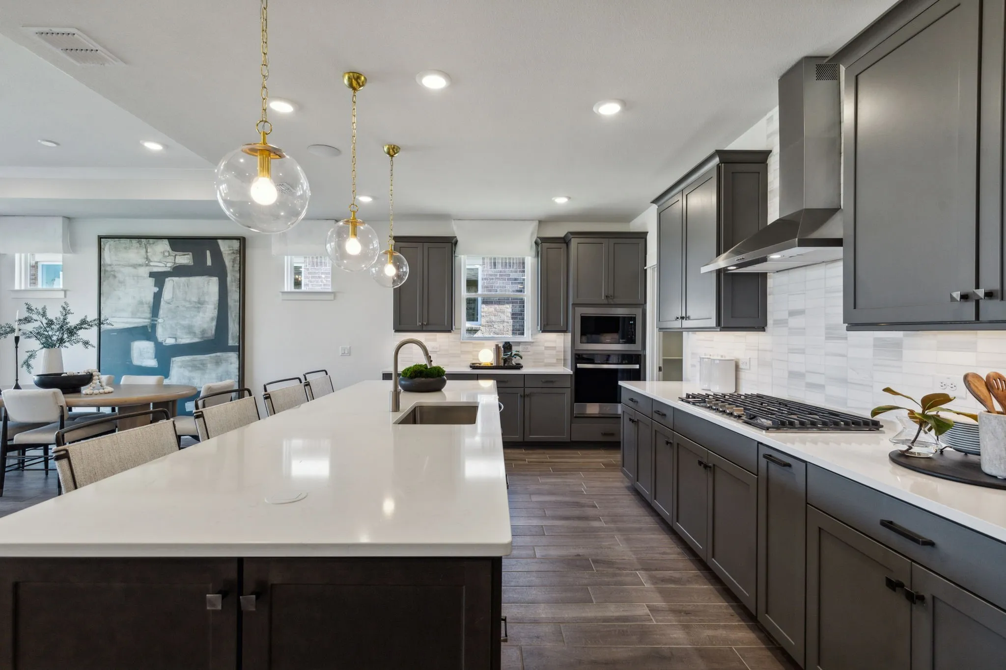 *Model Representation - Spacious kitchen with eat-in bartop island